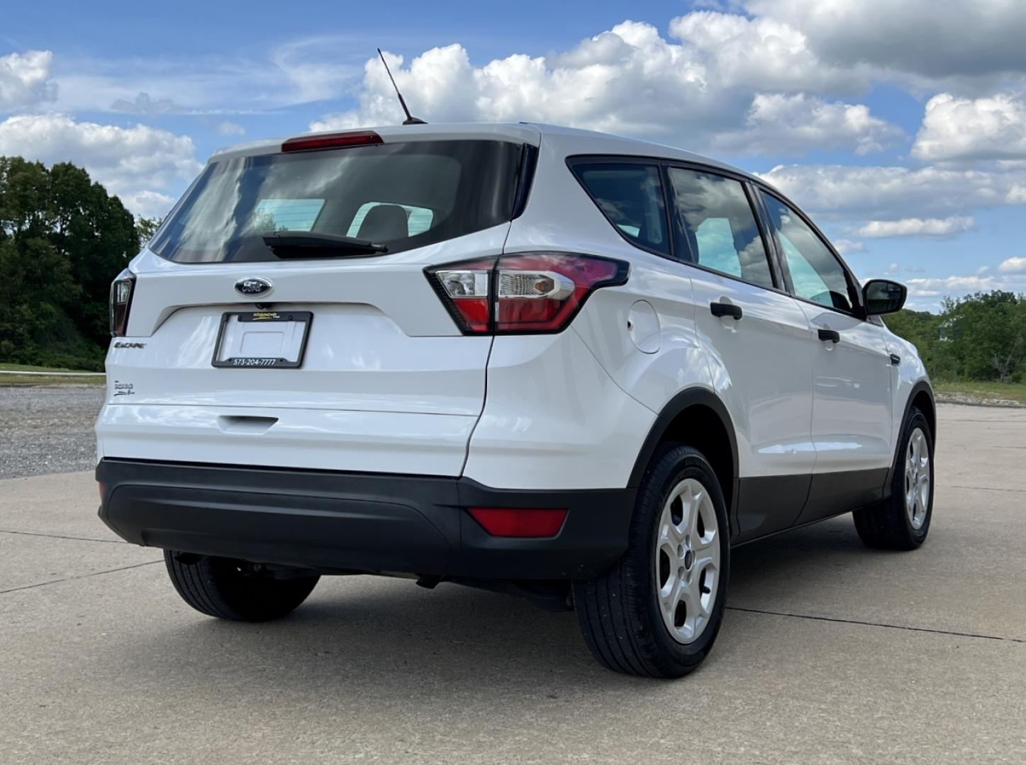 2017 WHITE /Gray Cloth Ford Escape S FWD (1FMCU0F71HU) with an 2.5L 4 Cyl. engine, Automatic transmission, located at 506 S. Kingshighway, Cape Girardeau, MO, 63703, (573) 235-5000, 37.294994, -89.556206 - 2017 Ford Escape S 80xxx miles Front Wheel Drive 2.5L 4 Cyl. Automatic Backup Camera Bluetooth Cruise Power Windows/Locks/Mirrors We have financing available and we accept trades! Fill out a credit application on our website or come by today! If you have any questions, give us a call at (5 - Photo#6