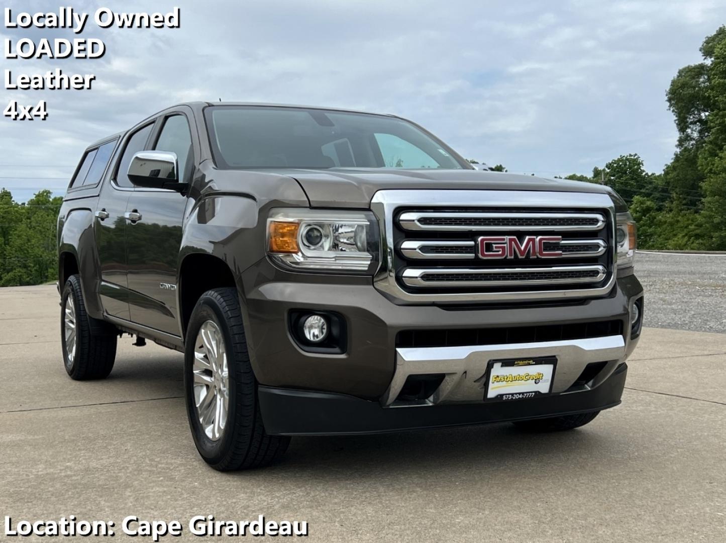 2015 BROWN /Tan Leather GMC Canyon SLT Crew Cab 4WD Short Box (1GTG6CE36F1) with an 3.6L V6 engine, Automatic transmission, located at 506 S. Kingshighway, Cape Girardeau, MO, 63703, (573) 235-5000, 37.294994, -89.556206 - 2015 GMC Canyon SLT 143xxx miles 4x4 3.6L V6 Leather Automatic Navigation Backup Camera Power/Heated Seats Cruise Power Windows/Locks/Mirrors We have financing available and we accept trades! Fill out a credit application on our website or come by today! If you have any questions, give u - Photo#0