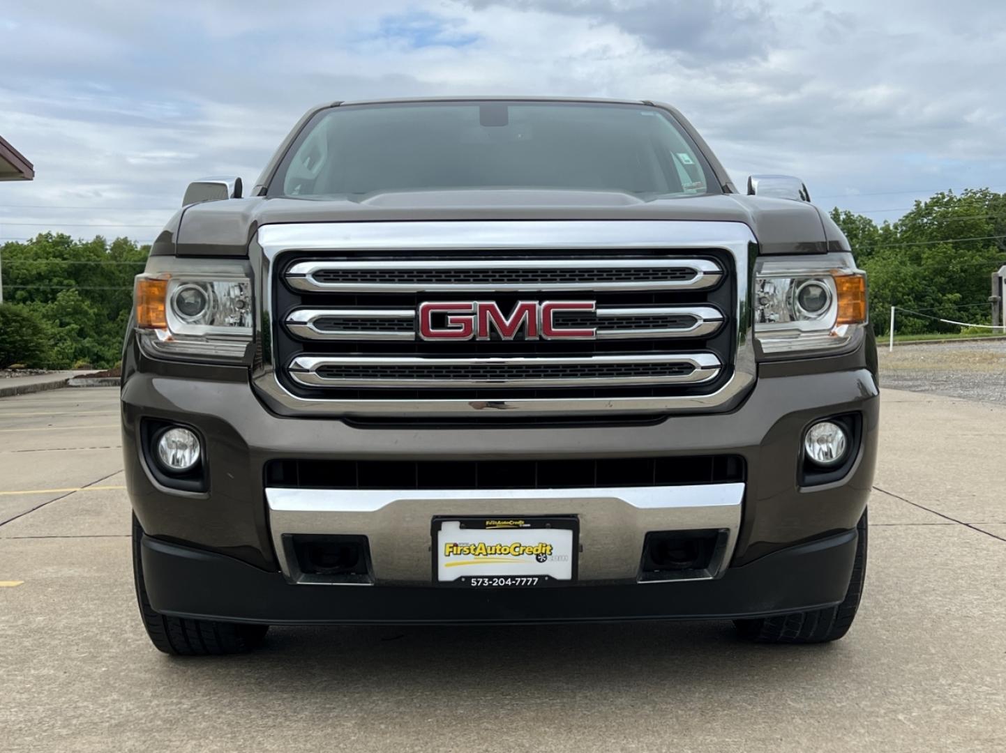2015 BROWN /Tan Leather GMC Canyon SLT Crew Cab 4WD Short Box (1GTG6CE36F1) with an 3.6L V6 engine, Automatic transmission, located at 506 S. Kingshighway, Cape Girardeau, MO, 63703, (573) 235-5000, 37.294994, -89.556206 - 2015 GMC Canyon SLT 143xxx miles 4x4 3.6L V6 Leather Automatic Navigation Backup Camera Power/Heated Seats Cruise Power Windows/Locks/Mirrors We have financing available and we accept trades! Fill out a credit application on our website or come by today! If you have any questions, give u - Photo#12