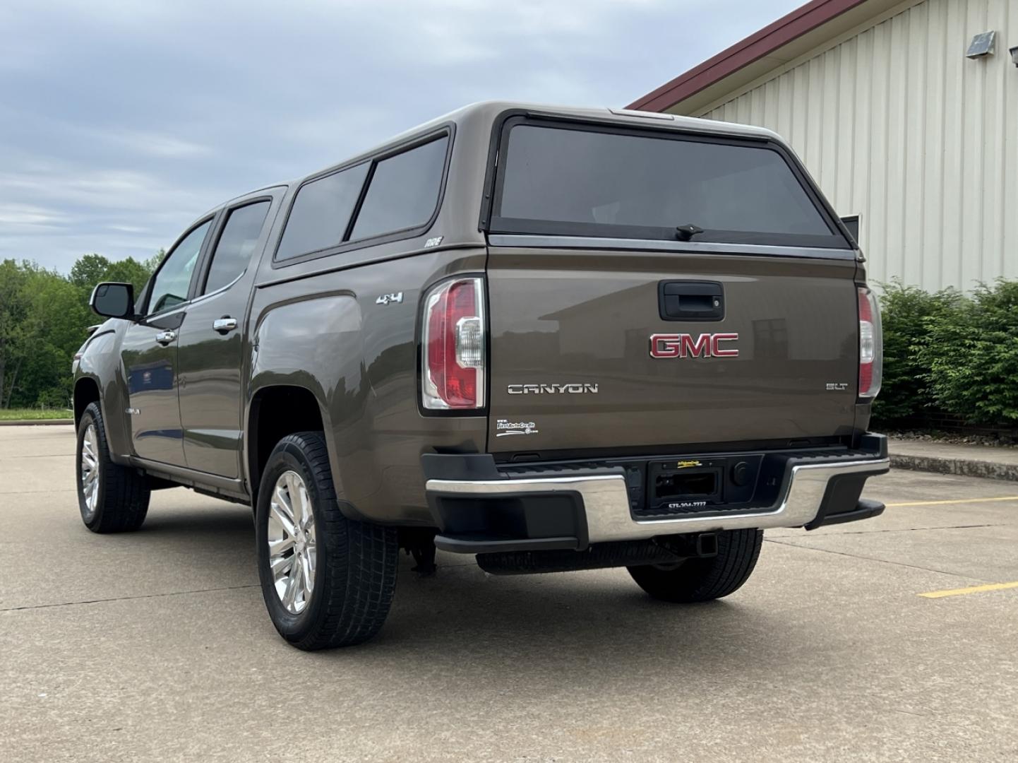 2015 BROWN /Tan Leather GMC Canyon SLT Crew Cab 4WD Short Box (1GTG6CE36F1) with an 3.6L V6 engine, Automatic transmission, located at 506 S. Kingshighway, Cape Girardeau, MO, 63703, (573) 235-5000, 37.294994, -89.556206 - 2015 GMC Canyon SLT 143xxx miles 4x4 3.6L V6 Leather Automatic Navigation Backup Camera Power/Heated Seats Cruise Power Windows/Locks/Mirrors We have financing available and we accept trades! Fill out a credit application on our website or come by today! If you have any questions, give u - Photo#10