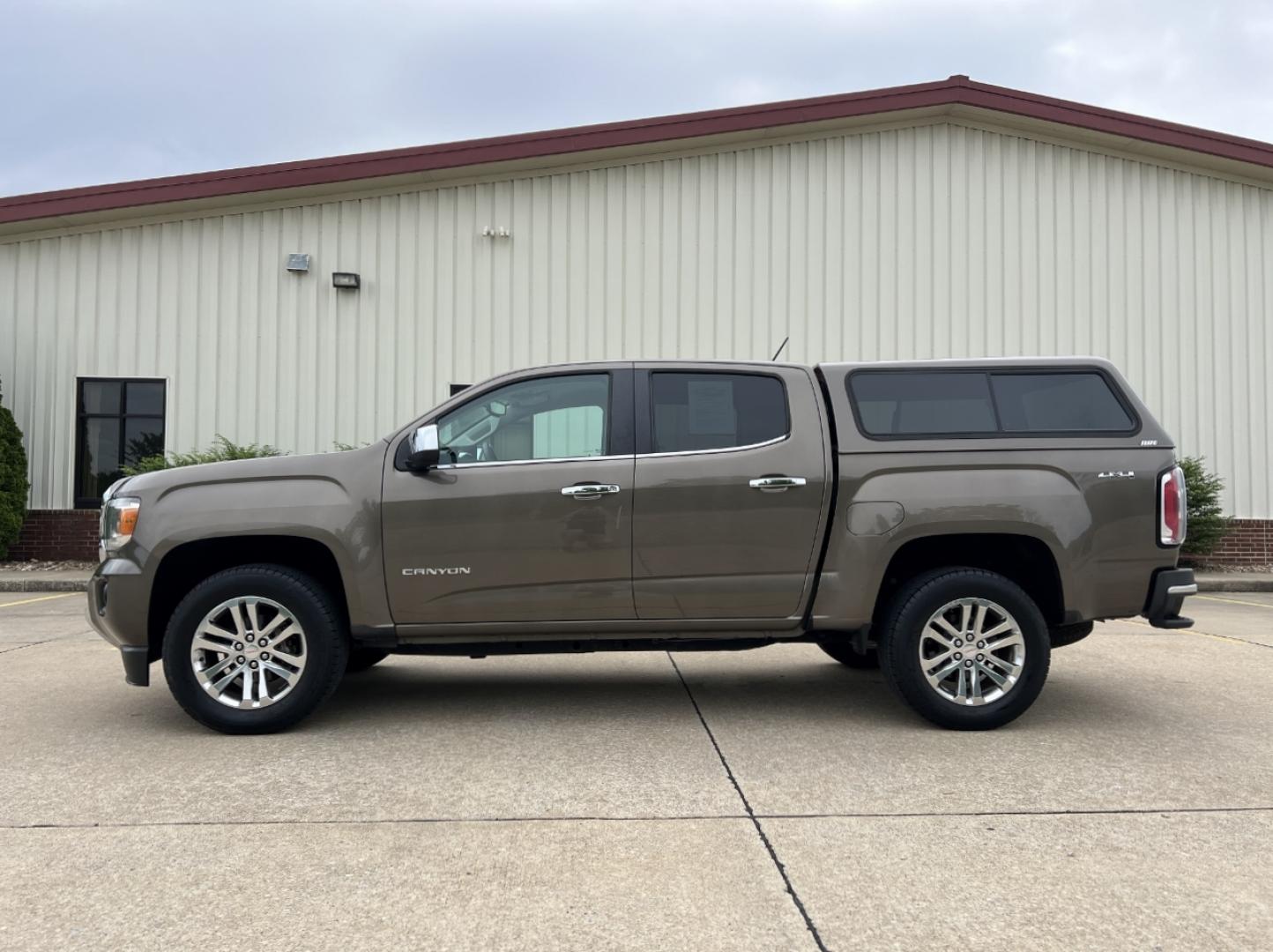 2015 BROWN /Tan Leather GMC Canyon SLT Crew Cab 4WD Short Box (1GTG6CE36F1) with an 3.6L V6 engine, Automatic transmission, located at 506 S. Kingshighway, Cape Girardeau, MO, 63703, (573) 235-5000, 37.294994, -89.556206 - 2015 GMC Canyon SLT 143xxx miles 4x4 3.6L V6 Leather Automatic Navigation Backup Camera Power/Heated Seats Cruise Power Windows/Locks/Mirrors We have financing available and we accept trades! Fill out a credit application on our website or come by today! If you have any questions, give u - Photo#7