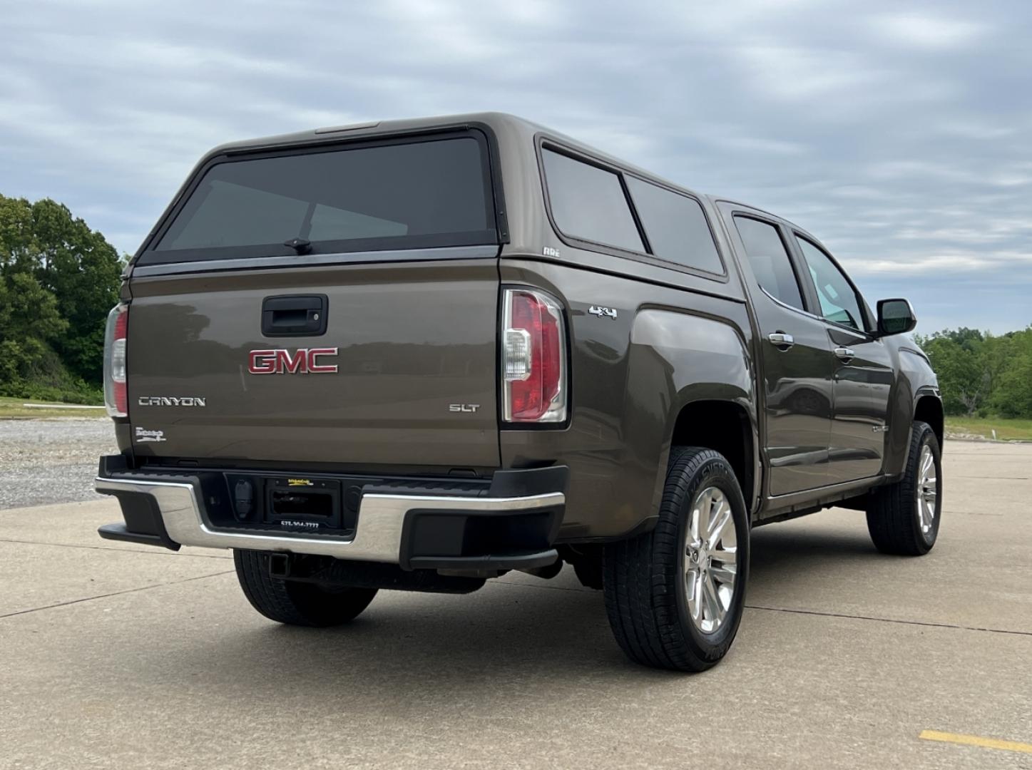 2015 BROWN /Tan Leather GMC Canyon SLT Crew Cab 4WD Short Box (1GTG6CE36F1) with an 3.6L V6 engine, Automatic transmission, located at 506 S. Kingshighway, Cape Girardeau, MO, 63703, (573) 235-5000, 37.294994, -89.556206 - 2015 GMC Canyon SLT 143xxx miles 4x4 3.6L V6 Leather Automatic Navigation Backup Camera Power/Heated Seats Cruise Power Windows/Locks/Mirrors We have financing available and we accept trades! Fill out a credit application on our website or come by today! If you have any questions, give u - Photo#9
