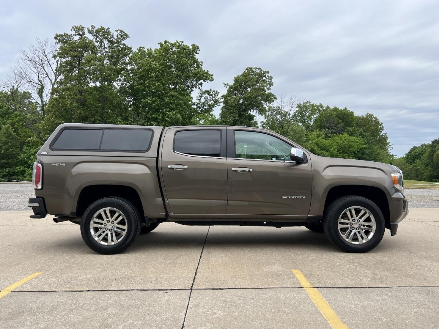 2015 BROWN /Tan Leather GMC Canyon SLT Crew Cab 4WD Short Box (1GTG6CE36F1) with an 3.6L V6 engine, Automatic transmission, located at 506 S. Kingshighway, Cape Girardeau, MO, 63703, (573) 235-5000, 37.294994, -89.556206 - 2015 GMC Canyon SLT 143xxx miles 4x4 3.6L V6 Leather Automatic Navigation Backup Camera Power/Heated Seats Cruise Power Windows/Locks/Mirrors We have financing available and we accept trades! Fill out a credit application on our website or come by today! If you have any questions, give u - Photo#8