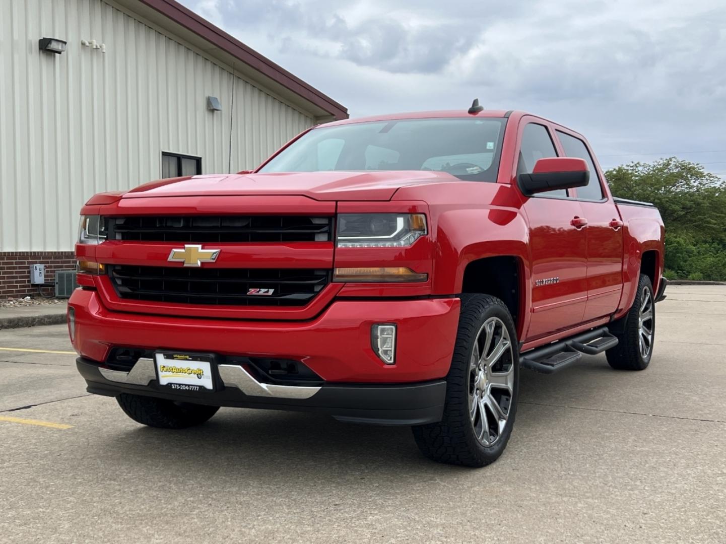 2017 RED /Gray Cloth Chevrolet Silverado 1500 LT Crew Cab 4WD (3GCUKREC1HG) with an 5.3L V8 engine, Automatic transmission, located at 506 S. Kingshighway, Cape Girardeau, MO, 63703, (573) 235-5000, 37.294994, -89.556206 - 2017 Chevrolet Silverado 1500 LT 77xxx miles 4x4 5.3L V8 Automatic Navigation Backup Camera Power Driver Seat Heated Seats Bluetooth Remote Start Cruise Power Windows/Locks/Mirrors We have financing available and we accept trades! Fill out a credit application on our website or come by - Photo#8