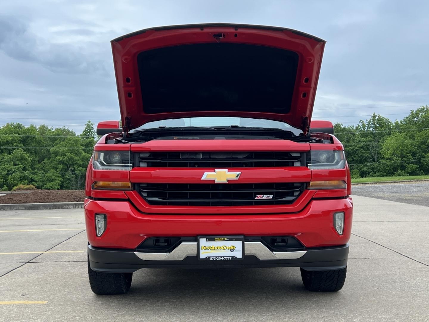 2017 RED /Gray Cloth Chevrolet Silverado 1500 LT Crew Cab 4WD (3GCUKREC1HG) with an 5.3L V8 engine, Automatic transmission, located at 506 S. Kingshighway, Cape Girardeau, MO, 63703, (573) 235-5000, 37.294994, -89.556206 - 2017 Chevrolet Silverado 1500 LT 77xxx miles 4x4 5.3L V8 Automatic Navigation Backup Camera Power Driver Seat Heated Seats Bluetooth Remote Start Cruise Power Windows/Locks/Mirrors We have financing available and we accept trades! Fill out a credit application on our website or come by - Photo#30