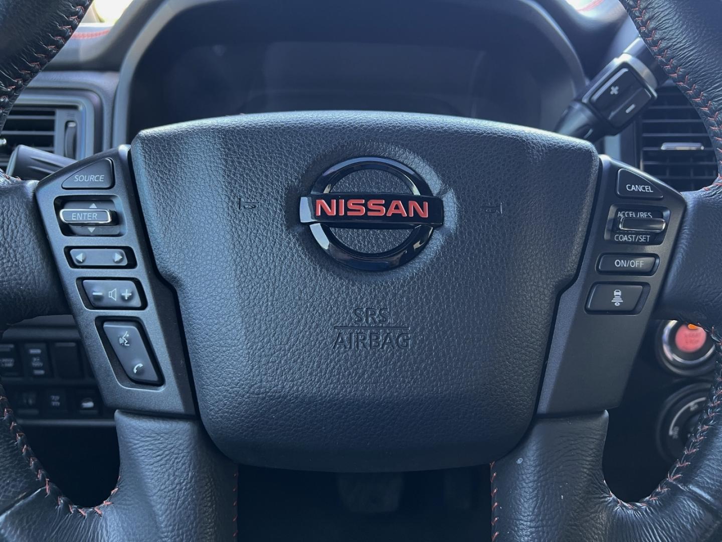 2021 RED /Black Leather/Cloth Nissan Titan PRO-4X (1N6AA1ED5MN) with an 5.6L V8 engine, Automatic transmission, located at 506 S. Kingshighway, Cape Girardeau, MO, 63703, (573) 235-5000, 37.294994, -89.556206 - 2021 Nissan Titan PRO-4X 1-Owner 136xxx miles 4x4 5.6L V8 Automatic Navigation Backup Camera Power Driver Seat Bluetooth Cruise Power Windows/Locks/Mirrors We have financing available and we accept trades! Fill out a credit application on our website or come by today! If you have any qu - Photo#22