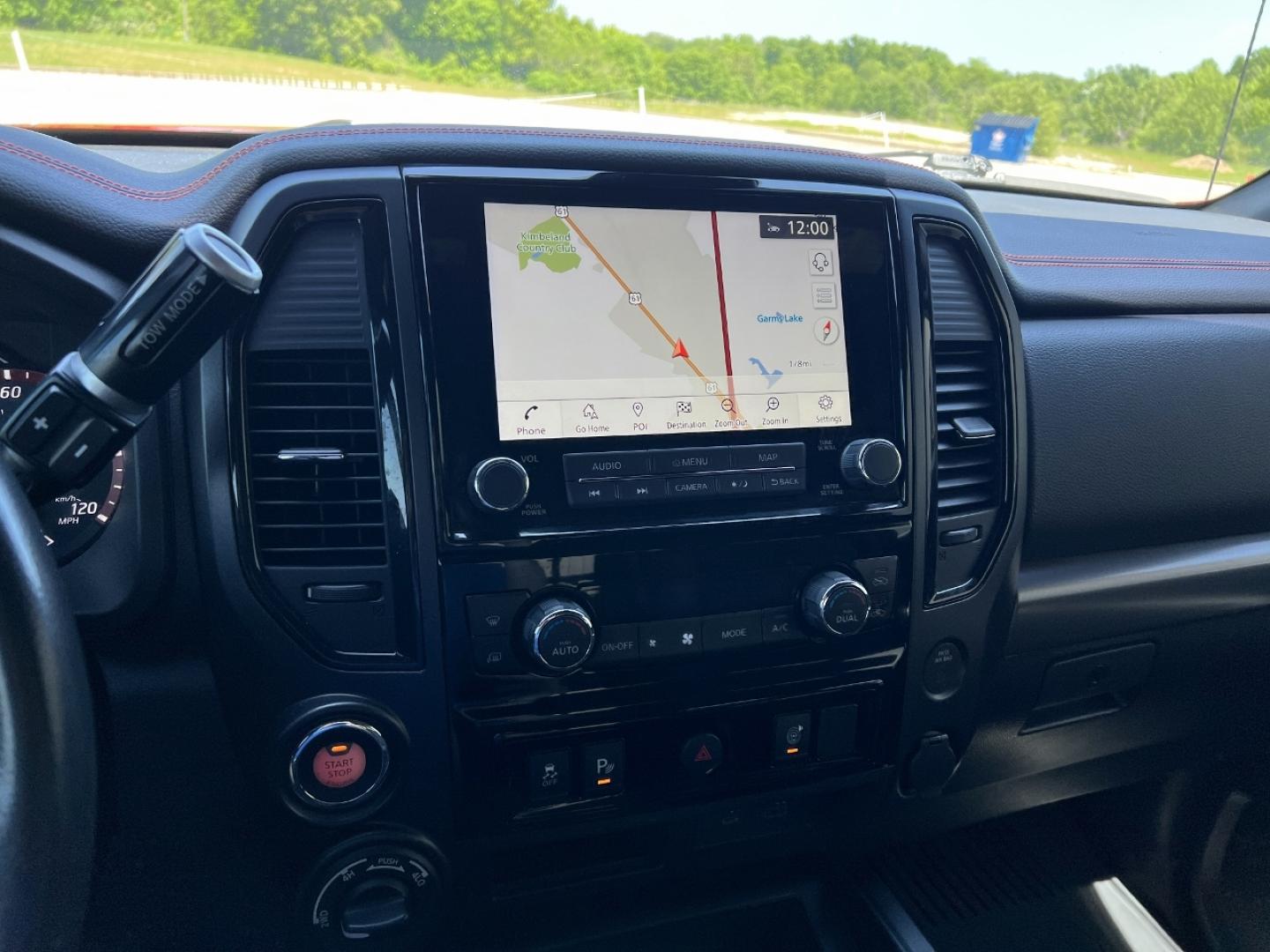 2021 RED /Black Leather/Cloth Nissan Titan PRO-4X (1N6AA1ED5MN) with an 5.6L V8 engine, Automatic transmission, located at 506 S. Kingshighway, Cape Girardeau, MO, 63703, (573) 235-5000, 37.294994, -89.556206 - 2021 Nissan Titan PRO-4X 1-Owner 136xxx miles 4x4 5.6L V8 Automatic Navigation Backup Camera Power Driver Seat Bluetooth Cruise Power Windows/Locks/Mirrors We have financing available and we accept trades! Fill out a credit application on our website or come by today! If you have any qu - Photo#24