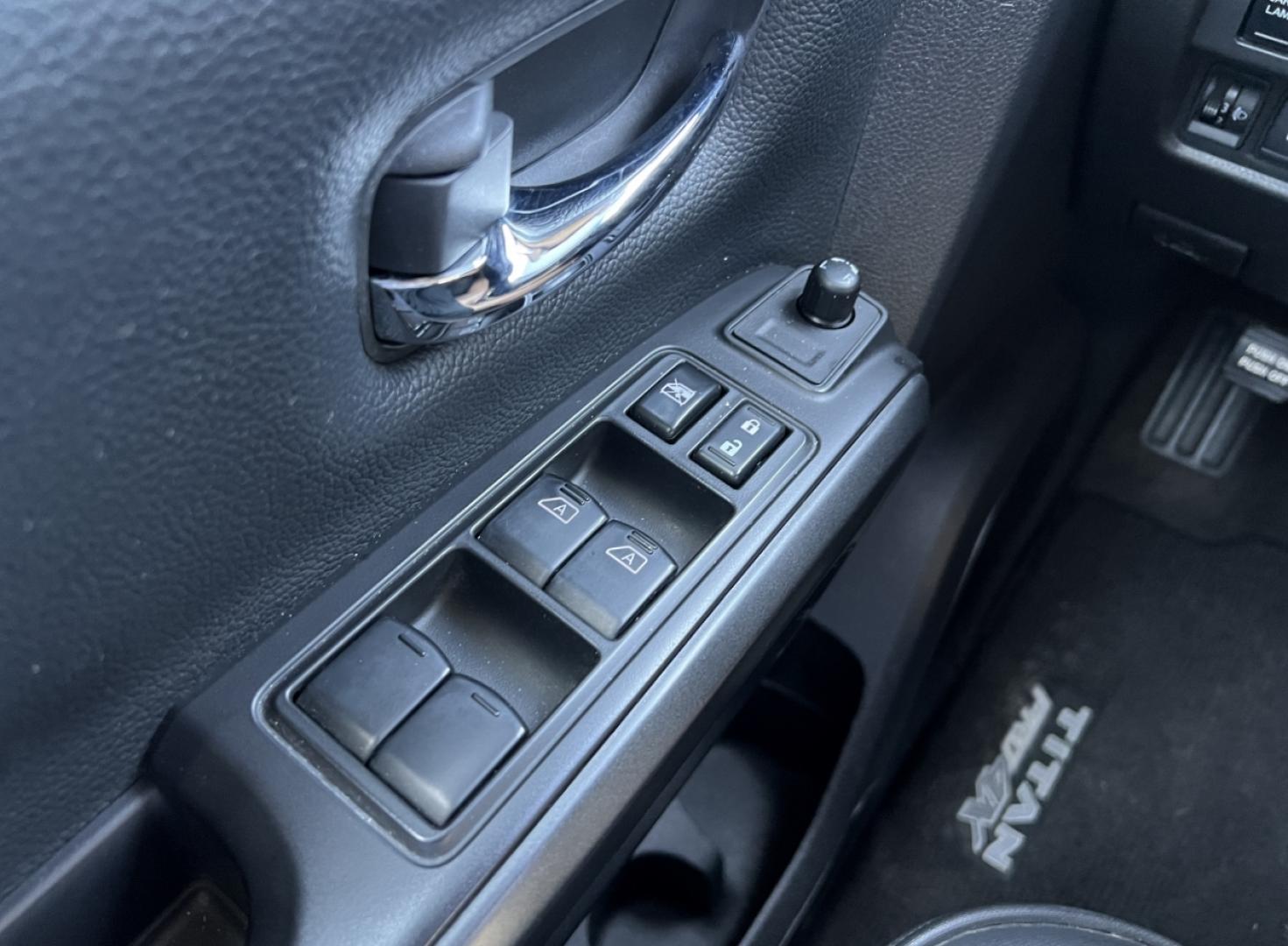 2021 RED /Black Leather/Cloth Nissan Titan PRO-4X (1N6AA1ED5MN) with an 5.6L V8 engine, Automatic transmission, located at 506 S. Kingshighway, Cape Girardeau, MO, 63703, (573) 235-5000, 37.294994, -89.556206 - 2021 Nissan Titan PRO-4X 1-Owner 136xxx miles 4x4 5.6L V8 Automatic Navigation Backup Camera Power Driver Seat Bluetooth Cruise Power Windows/Locks/Mirrors We have financing available and we accept trades! Fill out a credit application on our website or come by today! If you have any qu - Photo#27