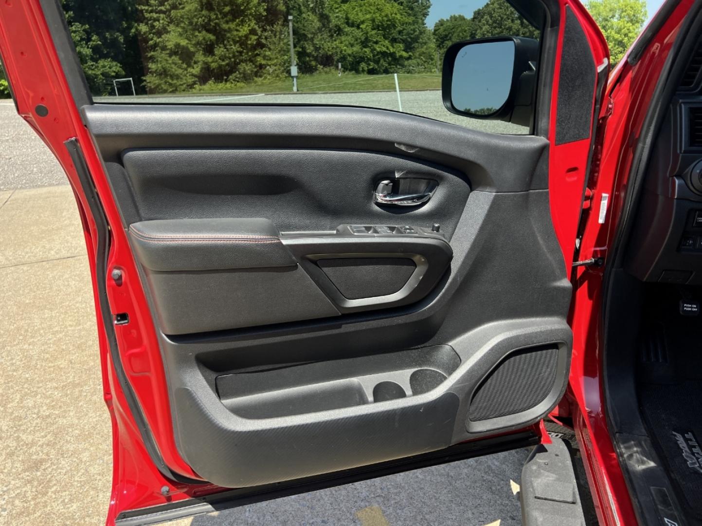 2021 RED /Black Leather/Cloth Nissan Titan PRO-4X (1N6AA1ED5MN) with an 5.6L V8 engine, Automatic transmission, located at 506 S. Kingshighway, Cape Girardeau, MO, 63703, (573) 235-5000, 37.294994, -89.556206 - 2021 Nissan Titan PRO-4X 1-Owner 136xxx miles 4x4 5.6L V8 Automatic Navigation Backup Camera Power Driver Seat Bluetooth Cruise Power Windows/Locks/Mirrors We have financing available and we accept trades! Fill out a credit application on our website or come by today! If you have any qu - Photo#13
