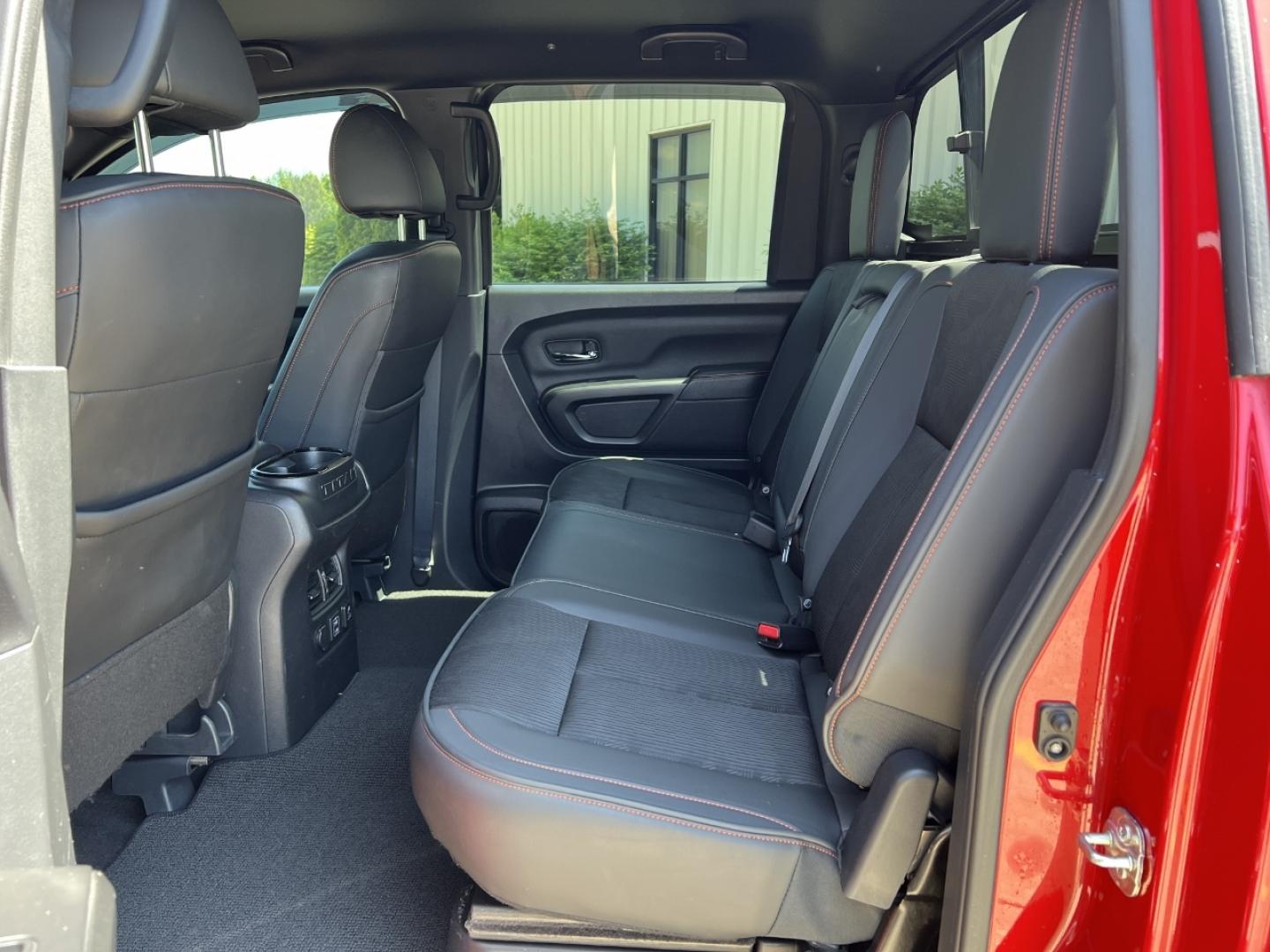 2021 RED /Black Leather/Cloth Nissan Titan PRO-4X (1N6AA1ED5MN) with an 5.6L V8 engine, Automatic transmission, located at 506 S. Kingshighway, Cape Girardeau, MO, 63703, (573) 235-5000, 37.294994, -89.556206 - 2021 Nissan Titan PRO-4X 1-Owner 136xxx miles 4x4 5.6L V8 Automatic Navigation Backup Camera Power Driver Seat Bluetooth Cruise Power Windows/Locks/Mirrors We have financing available and we accept trades! Fill out a credit application on our website or come by today! If you have any qu - Photo#17