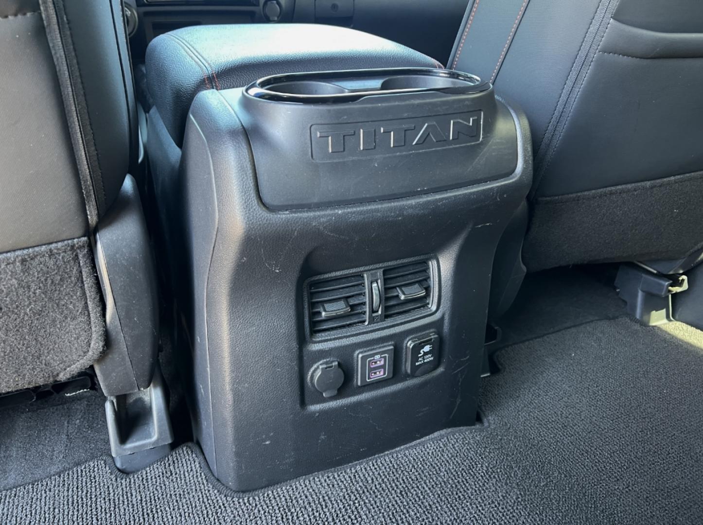 2021 RED /Black Leather/Cloth Nissan Titan PRO-4X (1N6AA1ED5MN) with an 5.6L V8 engine, Automatic transmission, located at 506 S. Kingshighway, Cape Girardeau, MO, 63703, (573) 235-5000, 37.294994, -89.556206 - 2021 Nissan Titan PRO-4X 1-Owner 136xxx miles 4x4 5.6L V8 Automatic Navigation Backup Camera Power Driver Seat Bluetooth Cruise Power Windows/Locks/Mirrors We have financing available and we accept trades! Fill out a credit application on our website or come by today! If you have any qu - Photo#31