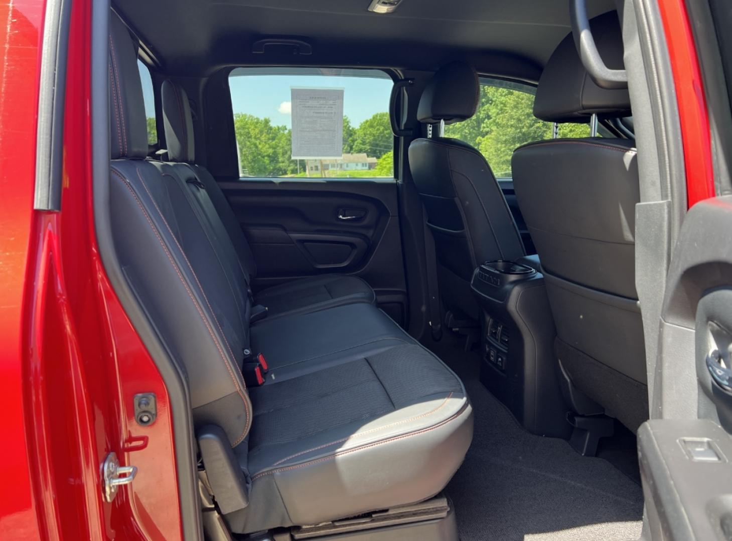 2021 RED /Black Leather/Cloth Nissan Titan PRO-4X (1N6AA1ED5MN) with an 5.6L V8 engine, Automatic transmission, located at 506 S. Kingshighway, Cape Girardeau, MO, 63703, (573) 235-5000, 37.294994, -89.556206 - 2021 Nissan Titan PRO-4X 1-Owner 136xxx miles 4x4 5.6L V8 Automatic Navigation Backup Camera Power Driver Seat Bluetooth Cruise Power Windows/Locks/Mirrors We have financing available and we accept trades! Fill out a credit application on our website or come by today! If you have any qu - Photo#18