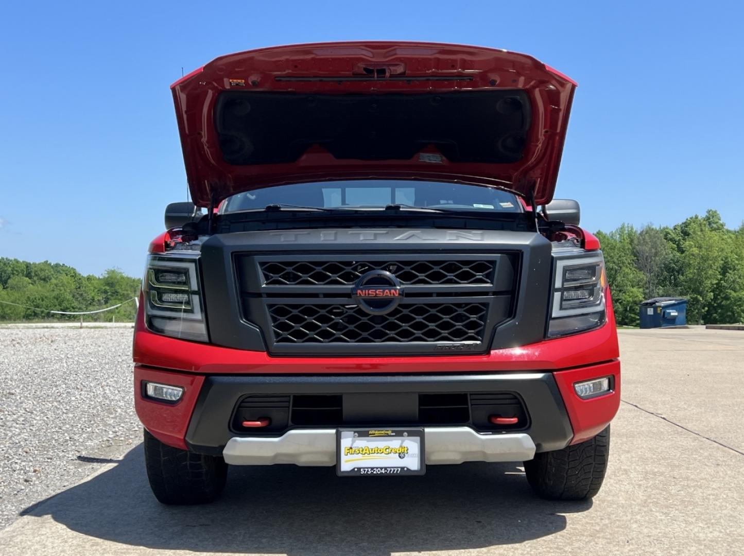 2021 RED /Black Leather/Cloth Nissan Titan PRO-4X (1N6AA1ED5MN) with an 5.6L V8 engine, Automatic transmission, located at 506 S. Kingshighway, Cape Girardeau, MO, 63703, (573) 235-5000, 37.294994, -89.556206 - 2021 Nissan Titan PRO-4X 1-Owner 136xxx miles 4x4 5.6L V8 Automatic Navigation Backup Camera Power Driver Seat Bluetooth Cruise Power Windows/Locks/Mirrors We have financing available and we accept trades! Fill out a credit application on our website or come by today! If you have any qu - Photo#33