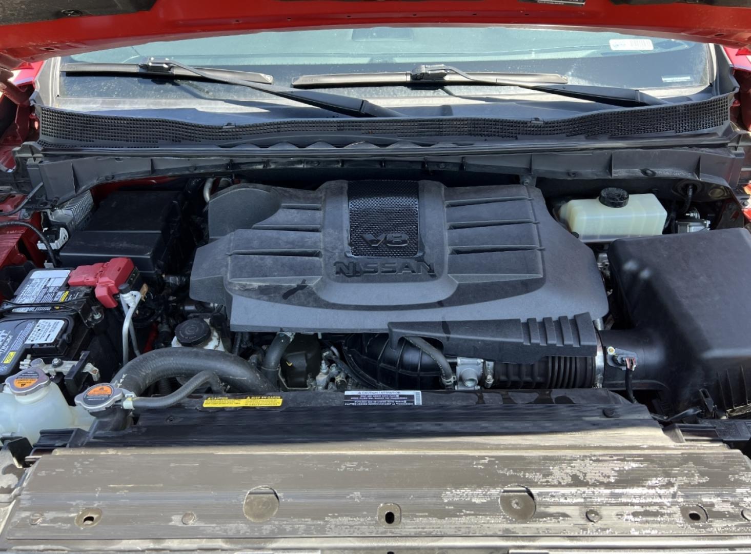 2021 RED /Black Leather/Cloth Nissan Titan PRO-4X (1N6AA1ED5MN) with an 5.6L V8 engine, Automatic transmission, located at 506 S. Kingshighway, Cape Girardeau, MO, 63703, (573) 235-5000, 37.294994, -89.556206 - 2021 Nissan Titan PRO-4X 1-Owner 136xxx miles 4x4 5.6L V8 Automatic Navigation Backup Camera Power Driver Seat Bluetooth Cruise Power Windows/Locks/Mirrors We have financing available and we accept trades! Fill out a credit application on our website or come by today! If you have any qu - Photo#34