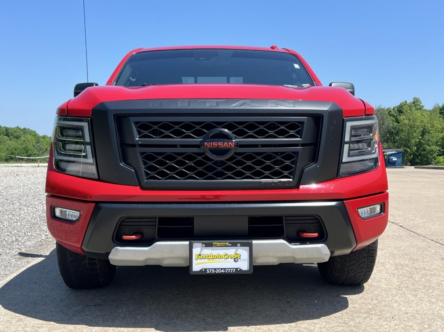 2021 RED /Black Leather/Cloth Nissan Titan PRO-4X (1N6AA1ED5MN) with an 5.6L V8 engine, Automatic transmission, located at 506 S. Kingshighway, Cape Girardeau, MO, 63703, (573) 235-5000, 37.294994, -89.556206 - 2021 Nissan Titan PRO-4X 1-Owner 136xxx miles 4x4 5.6L V8 Automatic Navigation Backup Camera Power Driver Seat Bluetooth Cruise Power Windows/Locks/Mirrors We have financing available and we accept trades! Fill out a credit application on our website or come by today! If you have any qu - Photo#12