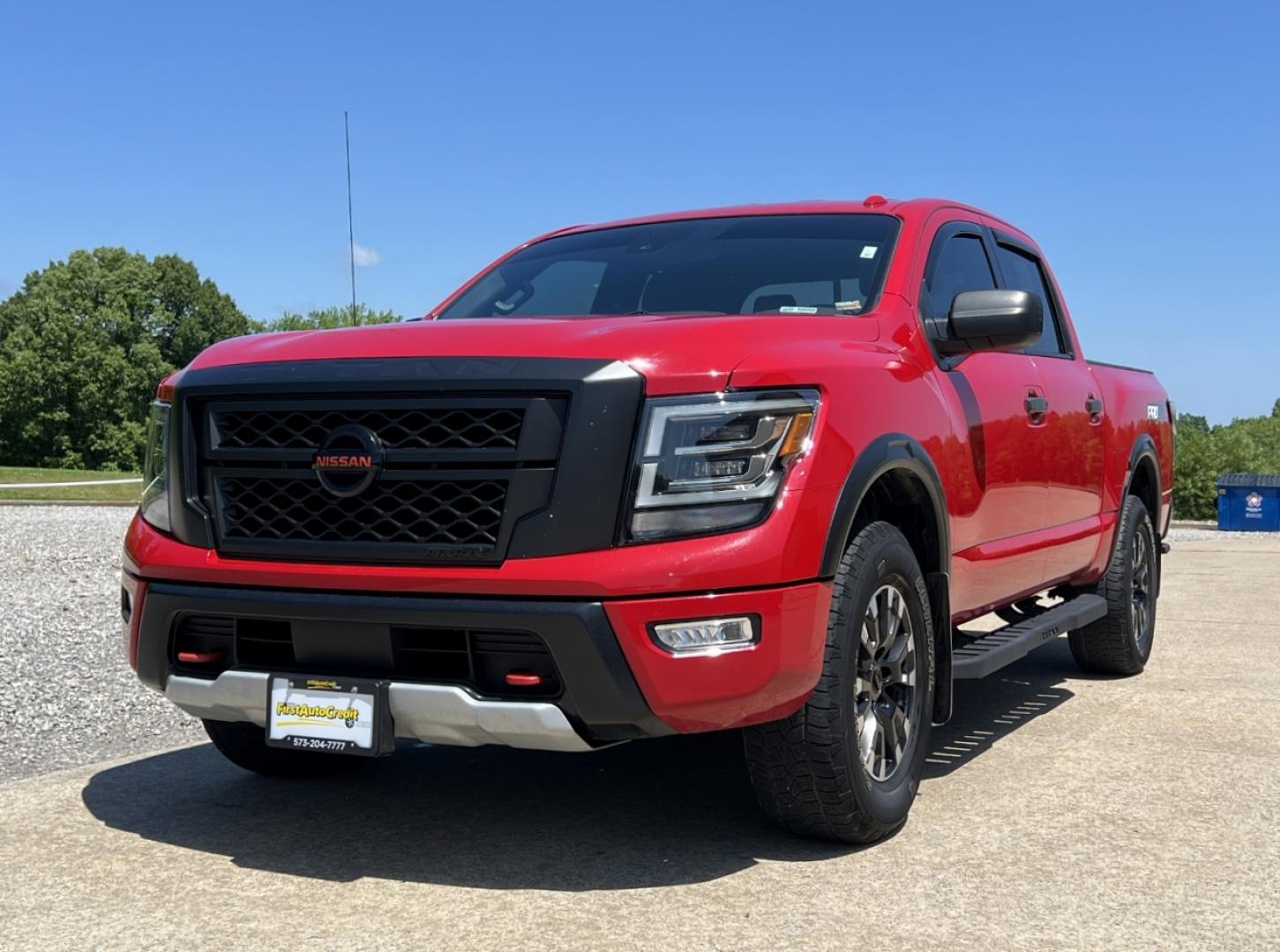 2021 RED /Black Leather/Cloth Nissan Titan PRO-4X (1N6AA1ED5MN) with an 5.6L V8 engine, Automatic transmission, located at 506 S. Kingshighway, Cape Girardeau, MO, 63703, (573) 235-5000, 37.294994, -89.556206 - 2021 Nissan Titan PRO-4X 1-Owner 136xxx miles 4x4 5.6L V8 Automatic Navigation Backup Camera Power Driver Seat Bluetooth Cruise Power Windows/Locks/Mirrors We have financing available and we accept trades! Fill out a credit application on our website or come by today! If you have any qu - Photo#6
