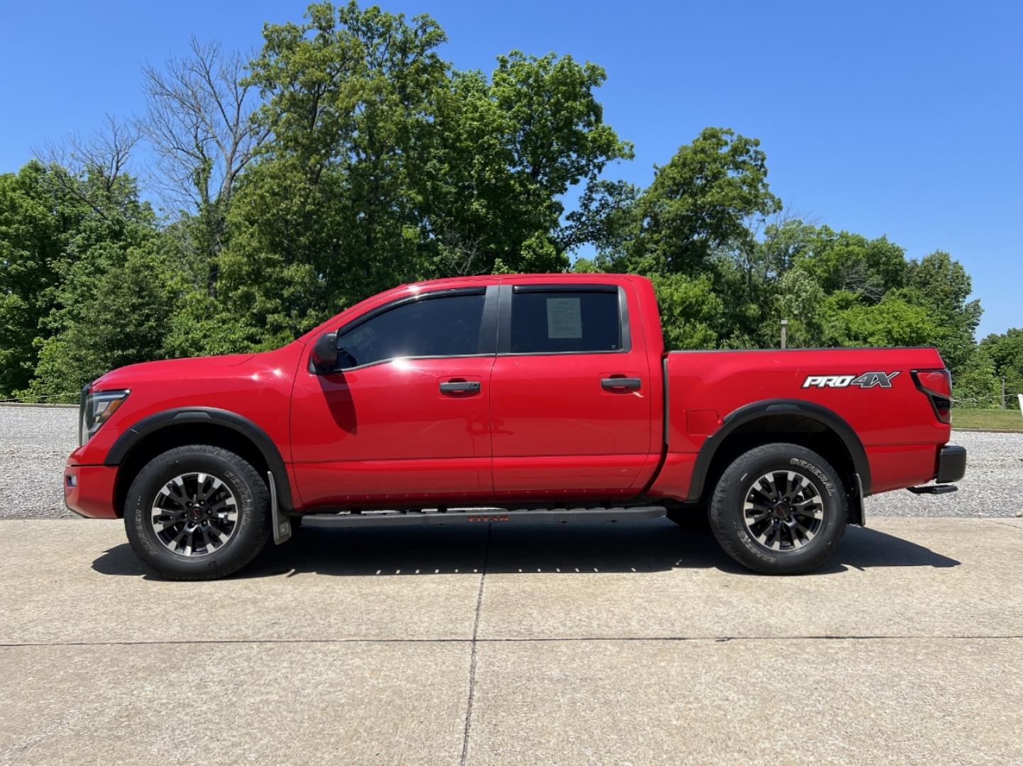 2021 RED /Black Leather/Cloth Nissan Titan PRO-4X (1N6AA1ED5MN) with an 5.6L V8 engine, Automatic transmission, located at 506 S. Kingshighway, Cape Girardeau, MO, 63703, (573) 235-5000, 37.294994, -89.556206 - 2021 Nissan Titan PRO-4X 1-Owner 136xxx miles 4x4 5.6L V8 Automatic Navigation Backup Camera Power Driver Seat Bluetooth Cruise Power Windows/Locks/Mirrors We have financing available and we accept trades! Fill out a credit application on our website or come by today! If you have any qu - Photo#7