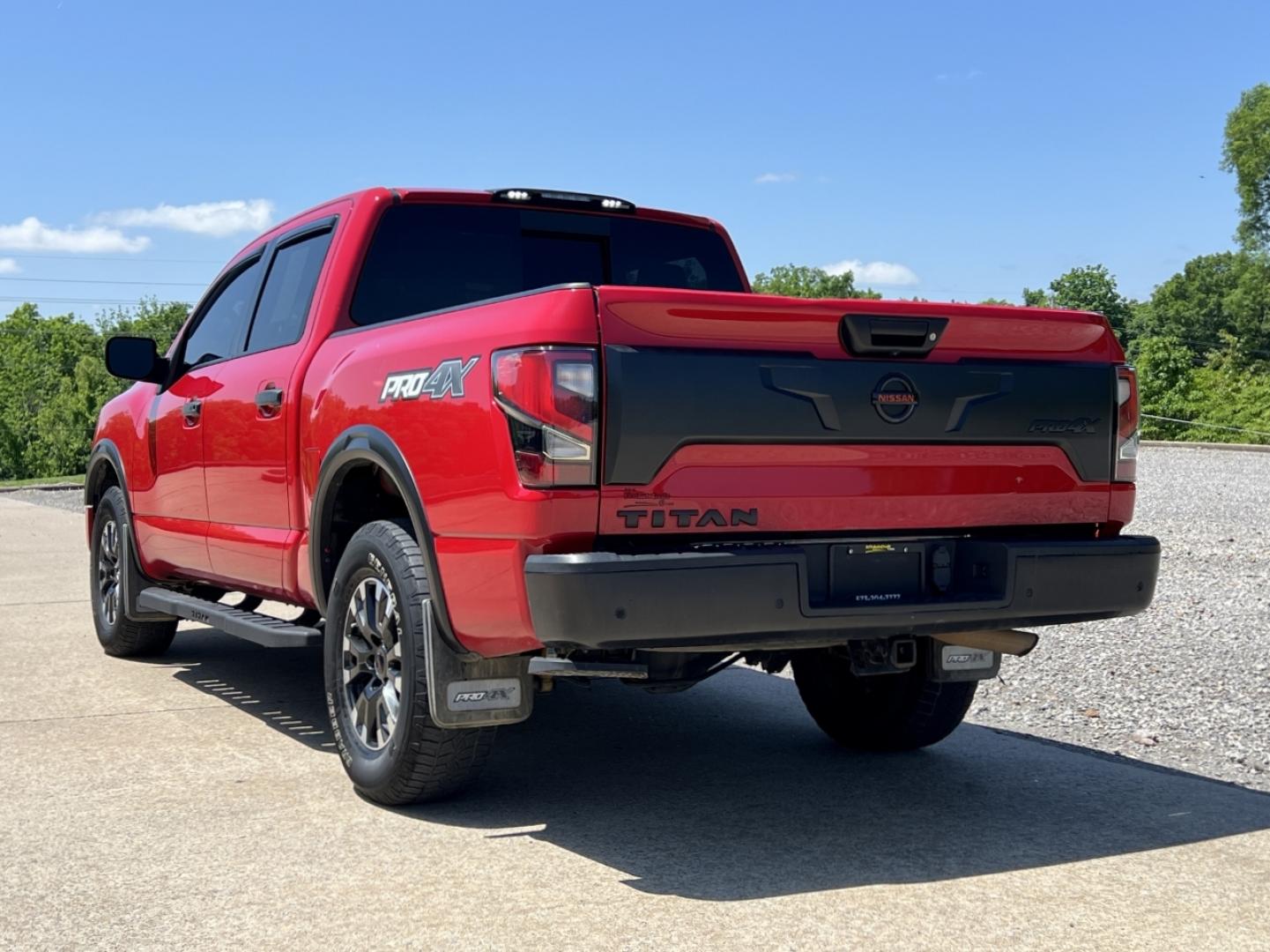 2021 RED /Black Leather/Cloth Nissan Titan PRO-4X (1N6AA1ED5MN) with an 5.6L V8 engine, Automatic transmission, located at 506 S. Kingshighway, Cape Girardeau, MO, 63703, (573) 235-5000, 37.294994, -89.556206 - 2021 Nissan Titan PRO-4X 1-Owner 136xxx miles 4x4 5.6L V8 Automatic Navigation Backup Camera Power Driver Seat Bluetooth Cruise Power Windows/Locks/Mirrors We have financing available and we accept trades! Fill out a credit application on our website or come by today! If you have any qu - Photo#10