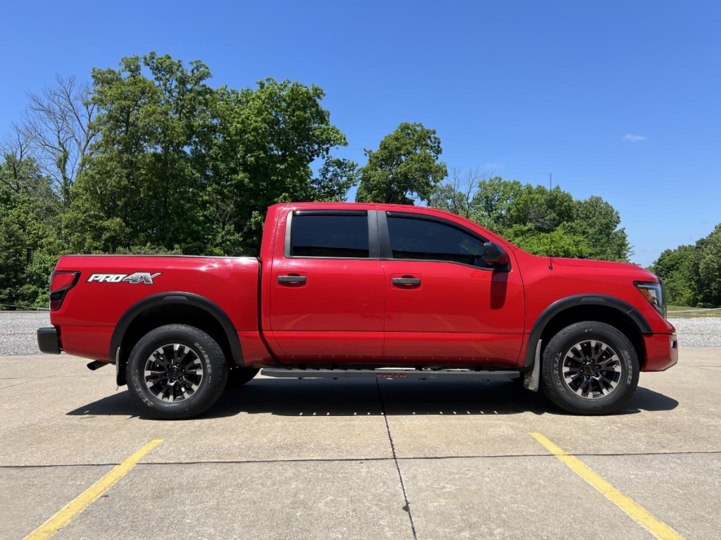 2021 RED /Black Leather/Cloth Nissan Titan PRO-4X (1N6AA1ED5MN) with an 5.6L V8 engine, Automatic transmission, located at 506 S. Kingshighway, Cape Girardeau, MO, 63703, (573) 235-5000, 37.294994, -89.556206 - 2021 Nissan Titan PRO-4X 1-Owner 136xxx miles 4x4 5.6L V8 Automatic Navigation Backup Camera Power Driver Seat Bluetooth Cruise Power Windows/Locks/Mirrors We have financing available and we accept trades! Fill out a credit application on our website or come by today! If you have any qu - Photo#8