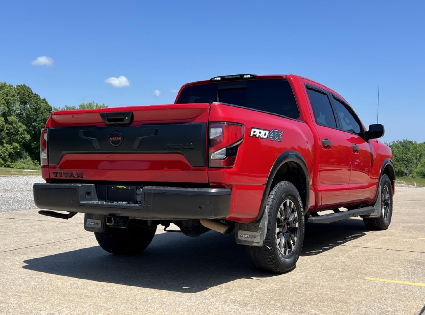2021 RED /Black Leather/Cloth Nissan Titan PRO-4X (1N6AA1ED5MN) with an 5.6L V8 engine, Automatic transmission, located at 506 S. Kingshighway, Cape Girardeau, MO, 63703, (573) 235-5000, 37.294994, -89.556206 - 2021 Nissan Titan PRO-4X 1-Owner 136xxx miles 4x4 5.6L V8 Automatic Navigation Backup Camera Power Driver Seat Bluetooth Cruise Power Windows/Locks/Mirrors We have financing available and we accept trades! Fill out a credit application on our website or come by today! If you have any qu - Photo#9