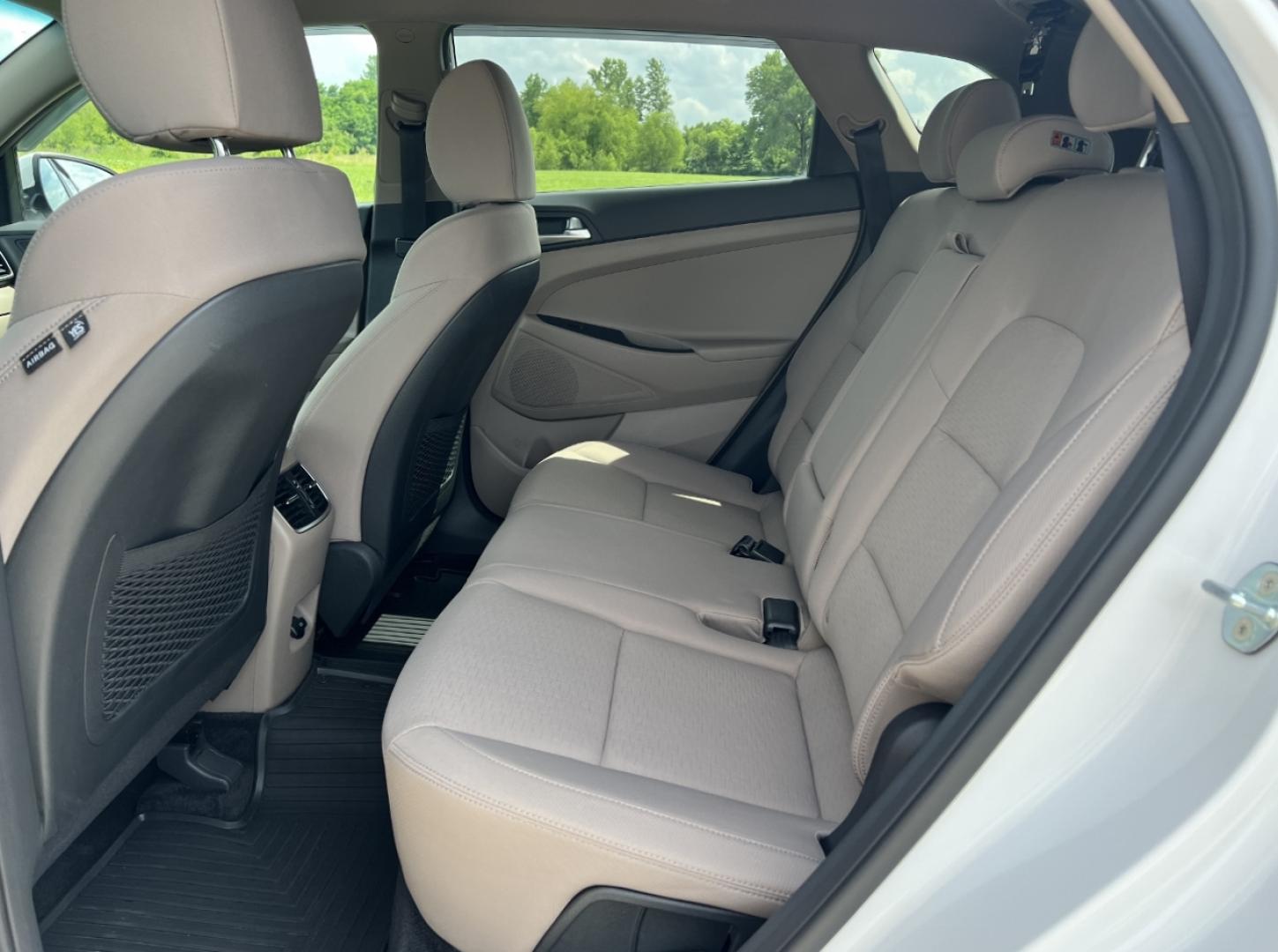 2020 WHITE /Tan Cloth Hyundai Tucson SEL (KM8J33AL8LU) with an 2.4L 4 Cyl. engine, Automatic transmission, located at 506 S. Kingshighway, Cape Girardeau, MO, 63703, (573) 235-5000, 37.294994, -89.556206 - 2020 Hyundai Tucson SEL 64xxx miles Front Wheel Drive 2.4L 4 Cyl. Automatic Backup Camera Power Driver Seat Heated Seats Bluetooth Cruise Power Windows/Locks/Mirrors We have financing available and we accept trades! Fill out a credit application on our website or come by today! If you ha - Photo#16