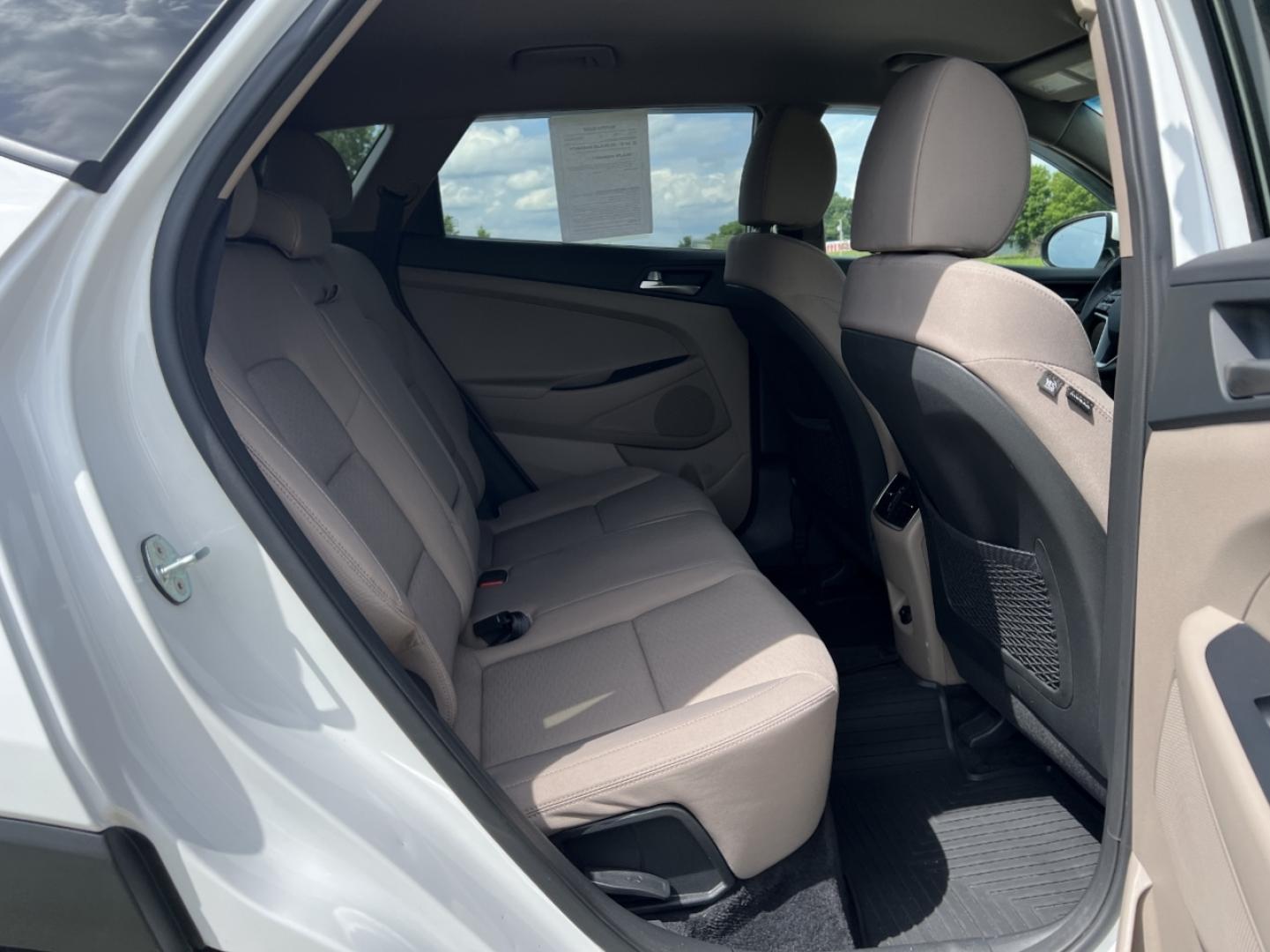 2020 WHITE /Tan Cloth Hyundai Tucson SEL (KM8J33AL8LU) with an 2.4L 4 Cyl. engine, Automatic transmission, located at 506 S. Kingshighway, Cape Girardeau, MO, 63703, (573) 235-5000, 37.294994, -89.556206 - 2020 Hyundai Tucson SEL 64xxx miles Front Wheel Drive 2.4L 4 Cyl. Automatic Backup Camera Power Driver Seat Heated Seats Bluetooth Cruise Power Windows/Locks/Mirrors We have financing available and we accept trades! Fill out a credit application on our website or come by today! If you ha - Photo#17