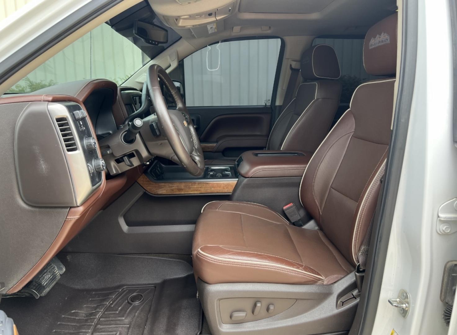 2016 WHITE /Brown Leather Chevrolet Silverado 1500 High Country Crew Cab Short Box 4WD (3GCUKTECXGG) with an 5.3L V8 engine, Automatic transmission, located at 506 S. Kingshighway, Cape Girardeau, MO, 63703, (573) 235-5000, 37.294994, -89.556206 - 2016 Chevrolet Silverado 1500 High Country 152xxx miles 4x4 5.3L V8 Automatic Leather Navigation Power/Heated/Cooled Seats Heated Steering Wheel Backup Camera Sunroof Bluetooth Remote Start Cruise Power Windows/Locks/Mirrors We have financing available and we accept trades! Fill out a - Photo#17