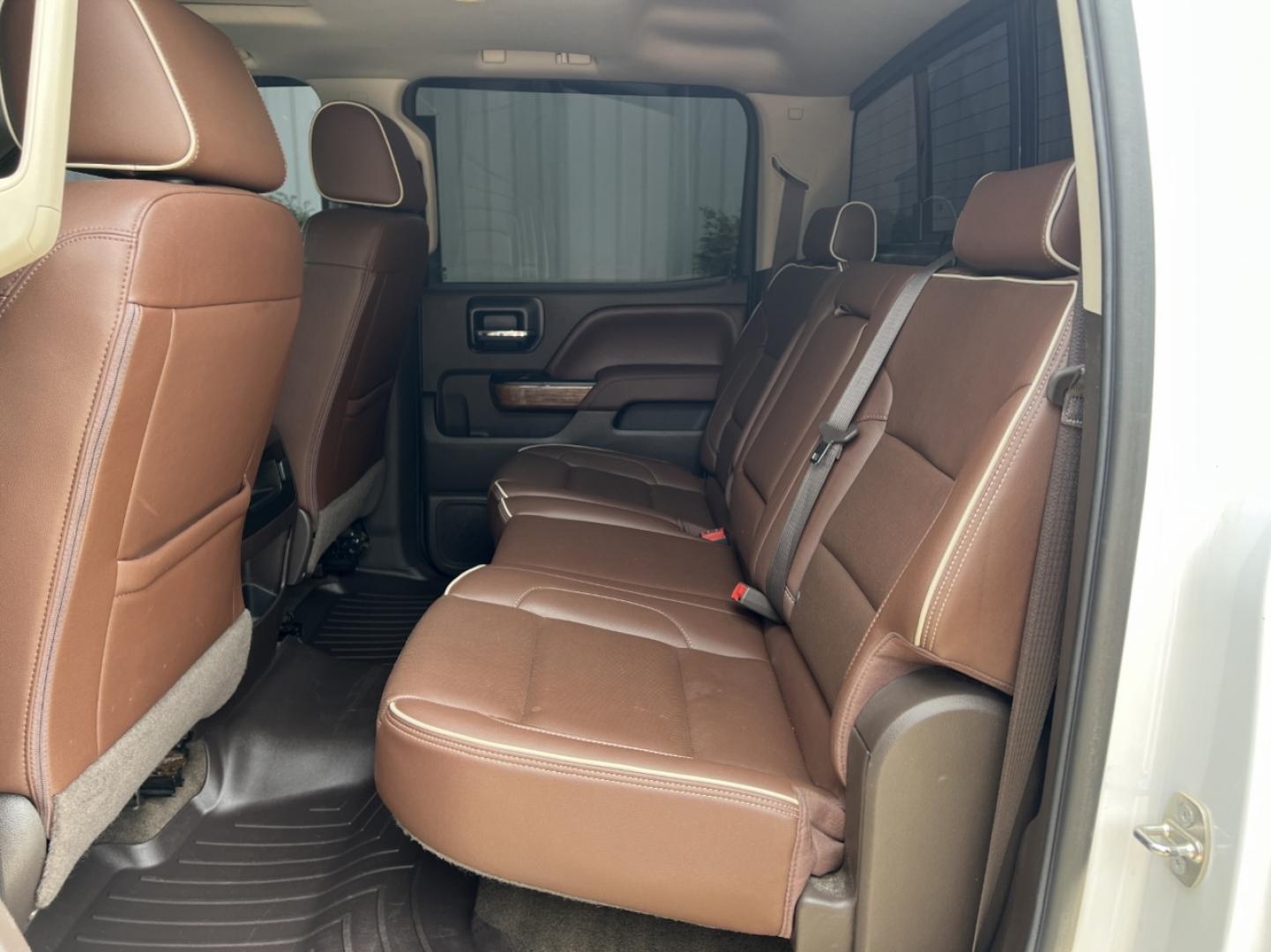 2016 WHITE /Brown Leather Chevrolet Silverado 1500 High Country Crew Cab Short Box 4WD (3GCUKTECXGG) with an 5.3L V8 engine, Automatic transmission, located at 506 S. Kingshighway, Cape Girardeau, MO, 63703, (573) 235-5000, 37.294994, -89.556206 - 2016 Chevrolet Silverado 1500 High Country 152xxx miles 4x4 5.3L V8 Automatic Leather Navigation Power/Heated/Cooled Seats Heated Steering Wheel Backup Camera Sunroof Bluetooth Remote Start Cruise Power Windows/Locks/Mirrors We have financing available and we accept trades! Fill out a - Photo#20