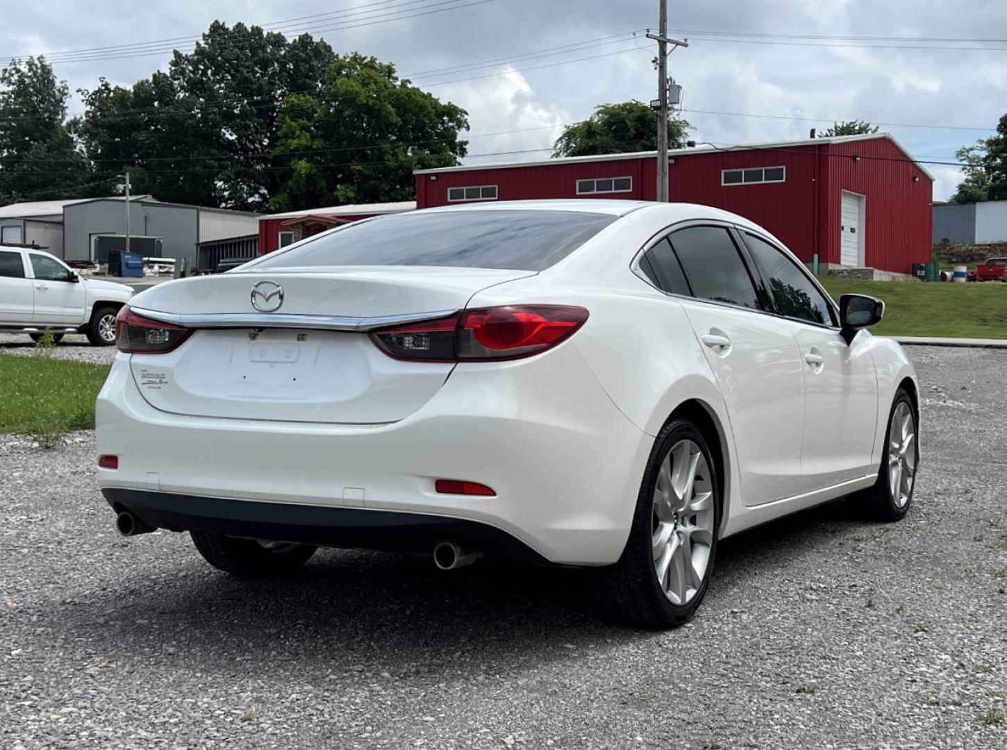 2014 WHITE /Black Leather Mazda Mazda6 i Touring (JM1GJ1V63E1) with an 2.5L 4 Cyl. engine, Automatic transmission, located at 2990 Old Orchard Rd., Jackson, MO, 63755, 37.354214, -89.612106 - 2014 Mazda 6 Touring 1-Owner 217xxx miles Front Wheel Drive 2.5L 4 Cyl. Automatic Leather Backup Camera Power Driver Seat Bluetooth Cruise Power Windows/Locks/Mirrors We have financing available and we accept trades! Fill out a credit application on our website or come by today! If you - Photo#7