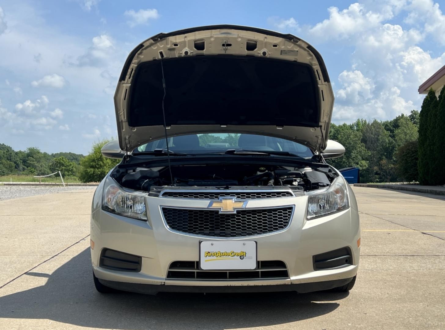 2014 GOLD /Black Cloth Chevrolet Cruze 1LT Auto (1G1PC5SB4E7) with an 1.4L 4 Cyl. Turbo engine, Automatic transmission, located at 2990 Old Orchard Rd., Jackson, MO, 63755, 37.354214, -89.612106 - 2014 Chevrolet Cruze LT Only 78xxx miles Front Wheel Drive 1.4L 4 Cyl. Automatic Power Driver Seat Remote Start Cruise Power Windows/Locks/Mirrors We have financing available and we accept trades! Fill out a credit application on our website or come by today! If you have any questions, giv - Photo#28