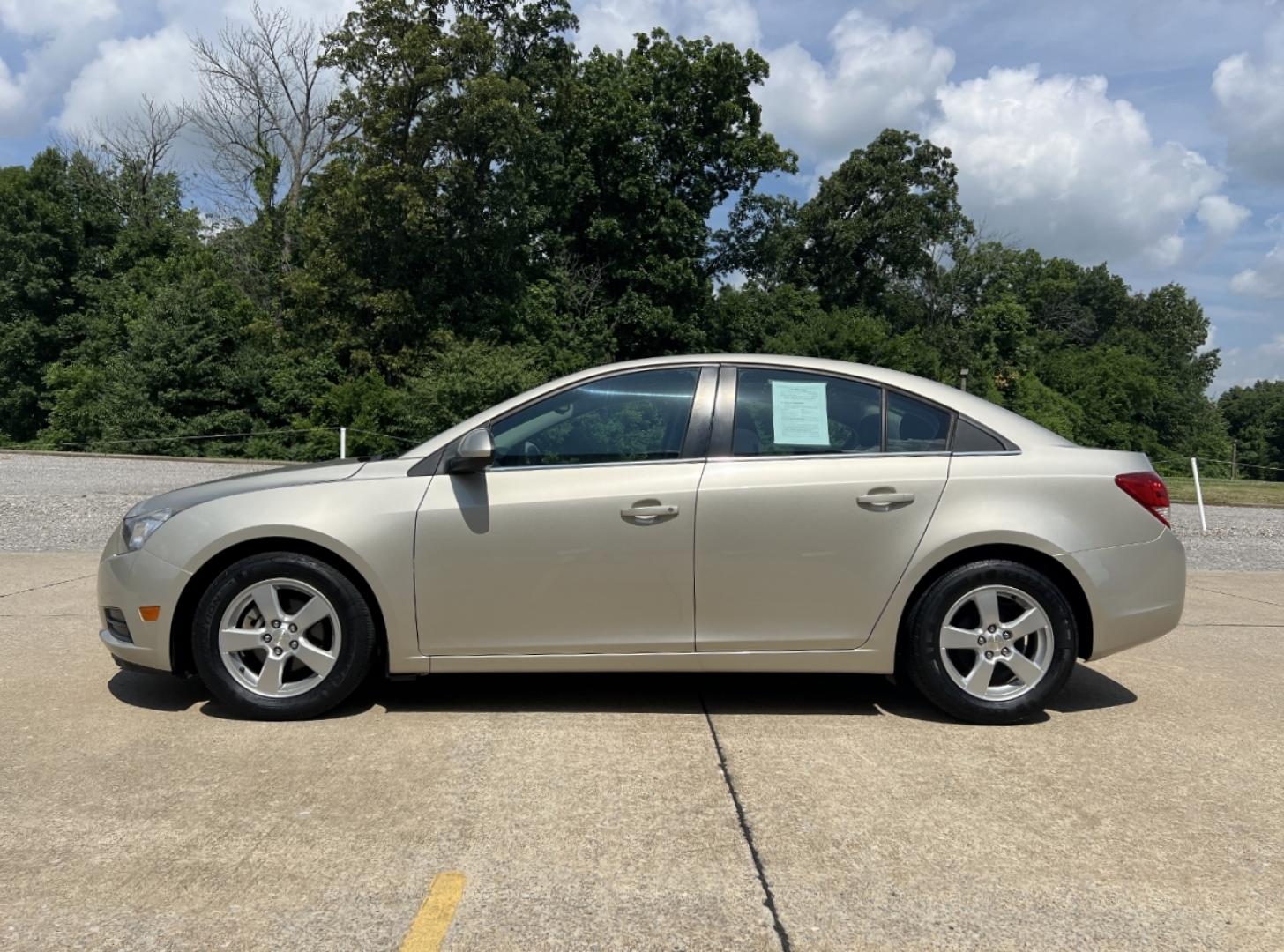 2014 GOLD /Black Cloth Chevrolet Cruze 1LT Auto (1G1PC5SB4E7) with an 1.4L 4 Cyl. Turbo engine, Automatic transmission, located at 2990 Old Orchard Rd., Jackson, MO, 63755, 37.354214, -89.612106 - 2014 Chevrolet Cruze LT Only 78xxx miles Front Wheel Drive 1.4L 4 Cyl. Automatic Power Driver Seat Remote Start Cruise Power Windows/Locks/Mirrors We have financing available and we accept trades! Fill out a credit application on our website or come by today! If you have any questions, giv - Photo#5