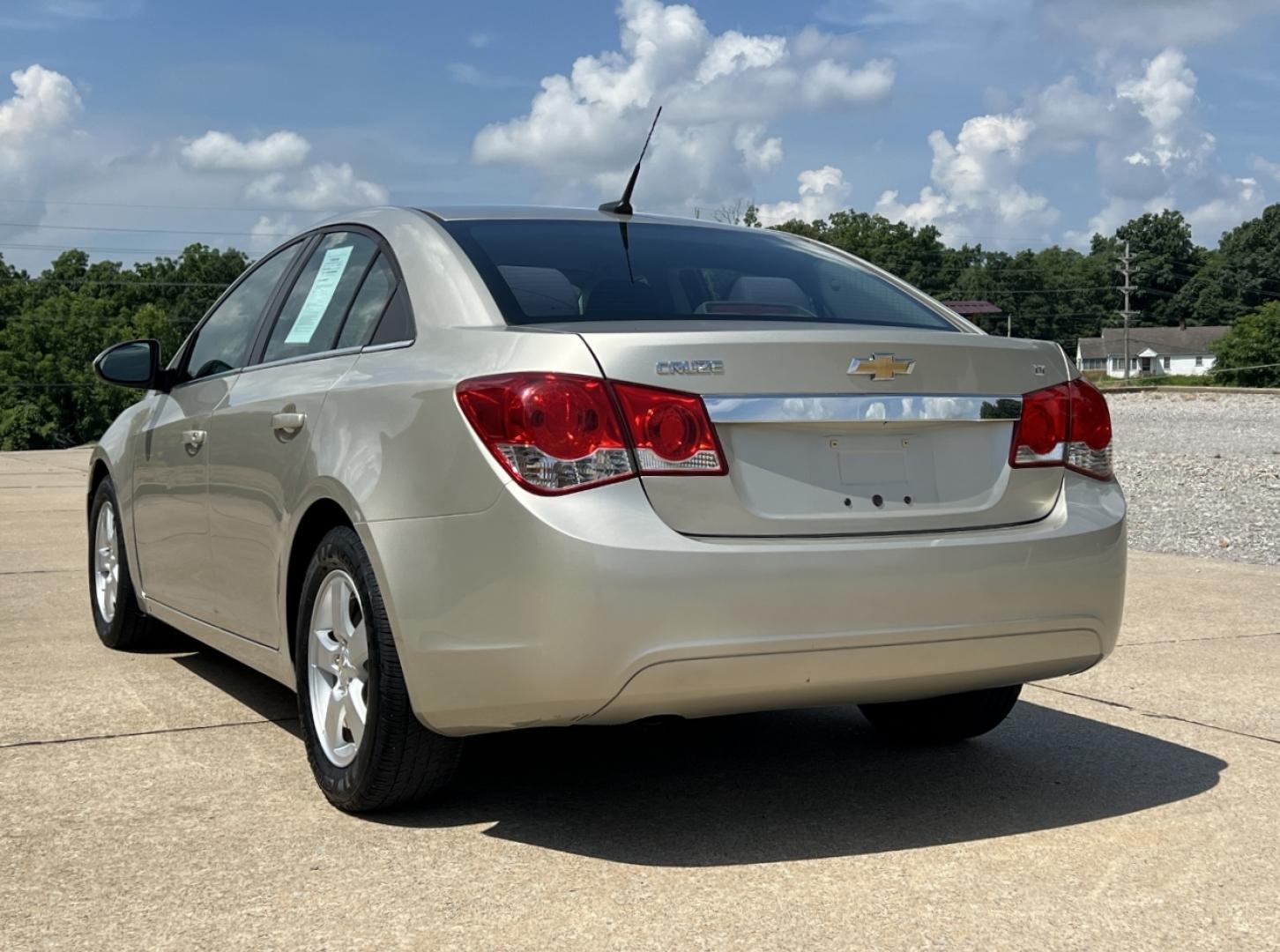 2014 GOLD /Black Cloth Chevrolet Cruze 1LT Auto (1G1PC5SB4E7) with an 1.4L 4 Cyl. Turbo engine, Automatic transmission, located at 2990 Old Orchard Rd., Jackson, MO, 63755, 37.354214, -89.612106 - 2014 Chevrolet Cruze LT Only 78xxx miles Front Wheel Drive 1.4L 4 Cyl. Automatic Power Driver Seat Remote Start Cruise Power Windows/Locks/Mirrors We have financing available and we accept trades! Fill out a credit application on our website or come by today! If you have any questions, giv - Photo#8