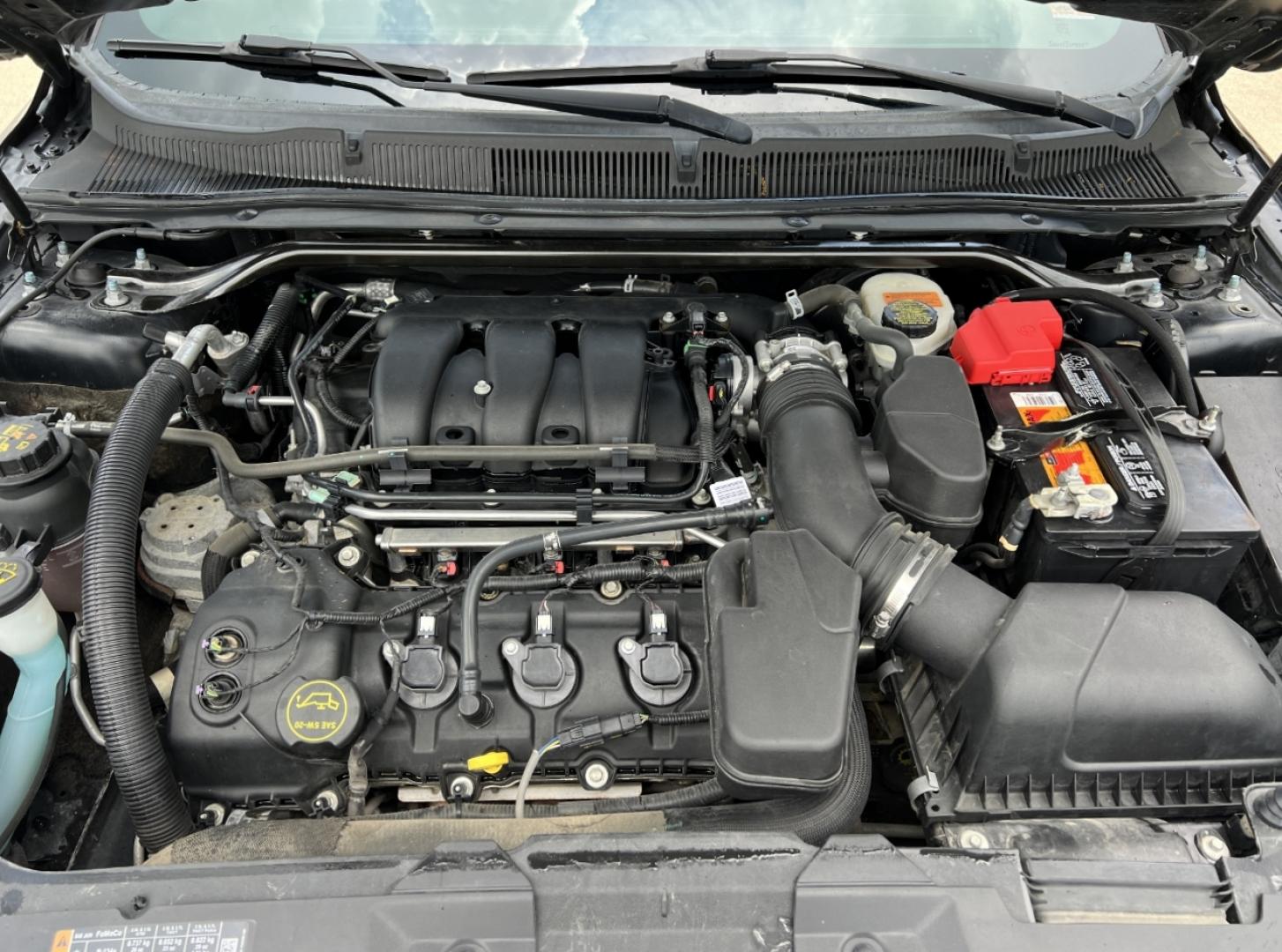 2016 BLACK /Black Leather Ford Taurus SEL FWD (1FAHP2E83GG) with an 3.5L V6 engine, Automatic transmission, located at 2990 Old Orchard Rd., Jackson, MO, 63755, 37.354214, -89.612106 - 2016 Ford Taurus SEL Only 84xxx miles Front Wheel Drive 3.5L V6 Automatic Leather Navigation Power/Heated Seats Backup Camera Bluetooth Remote Start Cruise Power Windows/Locks/Mirrors We have financing available and we accept trades! Fill out a credit application on our website or come - Photo#34
