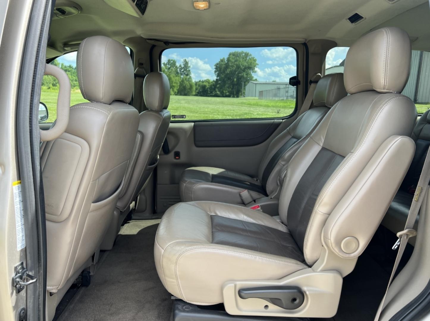 2002 GOLD /Tan Leather Oldsmobile Silhouette GL (1GHDX03E42D) with an 3.4L V6 engine, Automatic transmission, located at 506 S. Kingshighway, Cape Girardeau, MO, 63703, (573) 235-5000, 37.294994, -89.556206 - 2002 Oldsmobile Silhouette GL 139xxx miles Front Wheel Drive 3.4L V6 Automatic Leather 3rd Row Power/Heated Seats Cruise Power Windows/Locks/Mirrors We have financing available and we accept trades! Fill out a credit application on our website or come by today! If you have any questions, - Photo#15