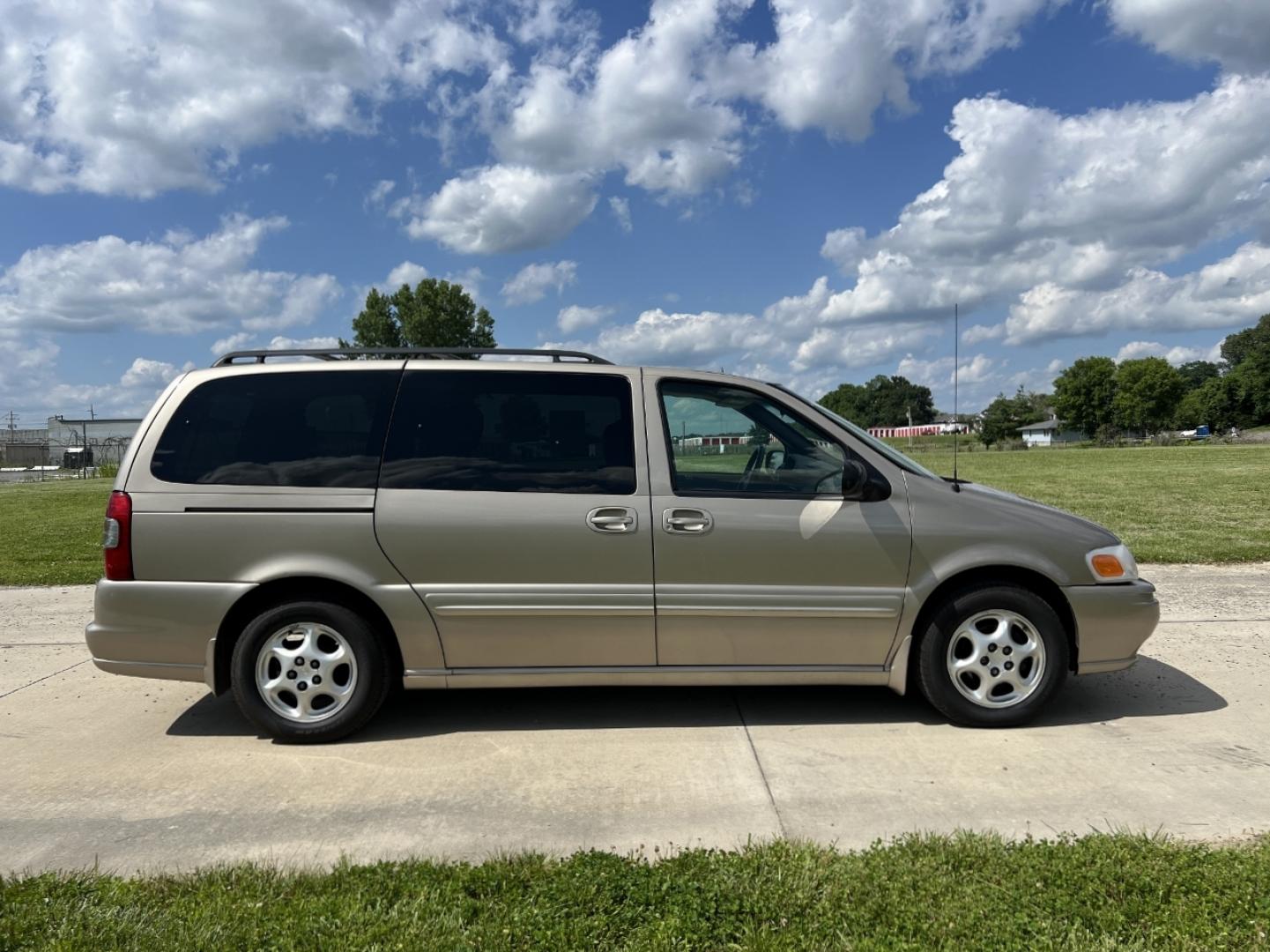 2002 GOLD /Tan Leather Oldsmobile Silhouette GL (1GHDX03E42D) with an 3.4L V6 engine, Automatic transmission, located at 506 S. Kingshighway, Cape Girardeau, MO, 63703, (573) 235-5000, 37.294994, -89.556206 - 2002 Oldsmobile Silhouette GL 139xxx miles Front Wheel Drive 3.4L V6 Automatic Leather 3rd Row Power/Heated Seats Cruise Power Windows/Locks/Mirrors We have financing available and we accept trades! Fill out a credit application on our website or come by today! If you have any questions, - Photo#6