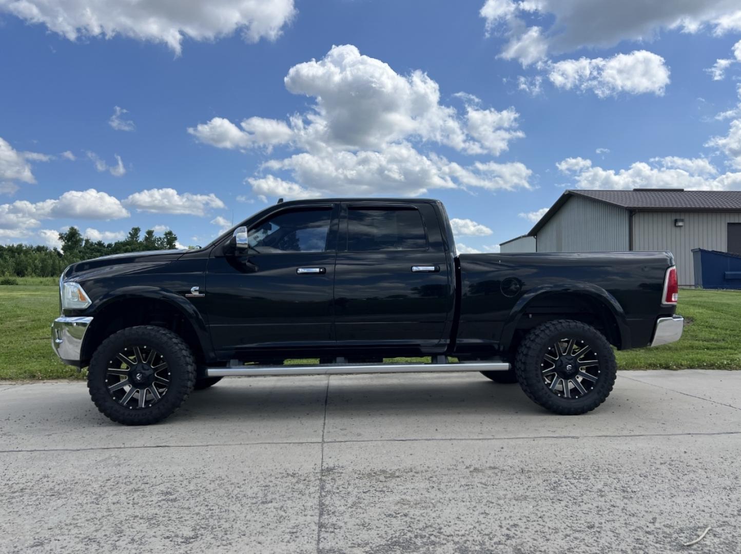 2014 BLACK /Black Leather RAM 2500 Laramie Crew Cab SWB 4WD (3C6UR5FL4EG) with an 6.7L I6 TURBO DIESEL engine, Automatic transmission, located at 506 S. Kingshighway, Cape Girardeau, MO, 63703, (573) 235-5000, 37.294994, -89.556206 - 2014 Ram 2500 Laramie 134xxx miles 4x4 6.7L I6 Turbo Diesel Automatic Leather Navigation Power/Heated/Cooled Seats Heated Rear Seats Heated Steering Wheel Backup Camera Bluetooth Remote Start Cruise Power Windows/Locks/Mirrors We have financing available and we accept trades! Fill out - Photo#10