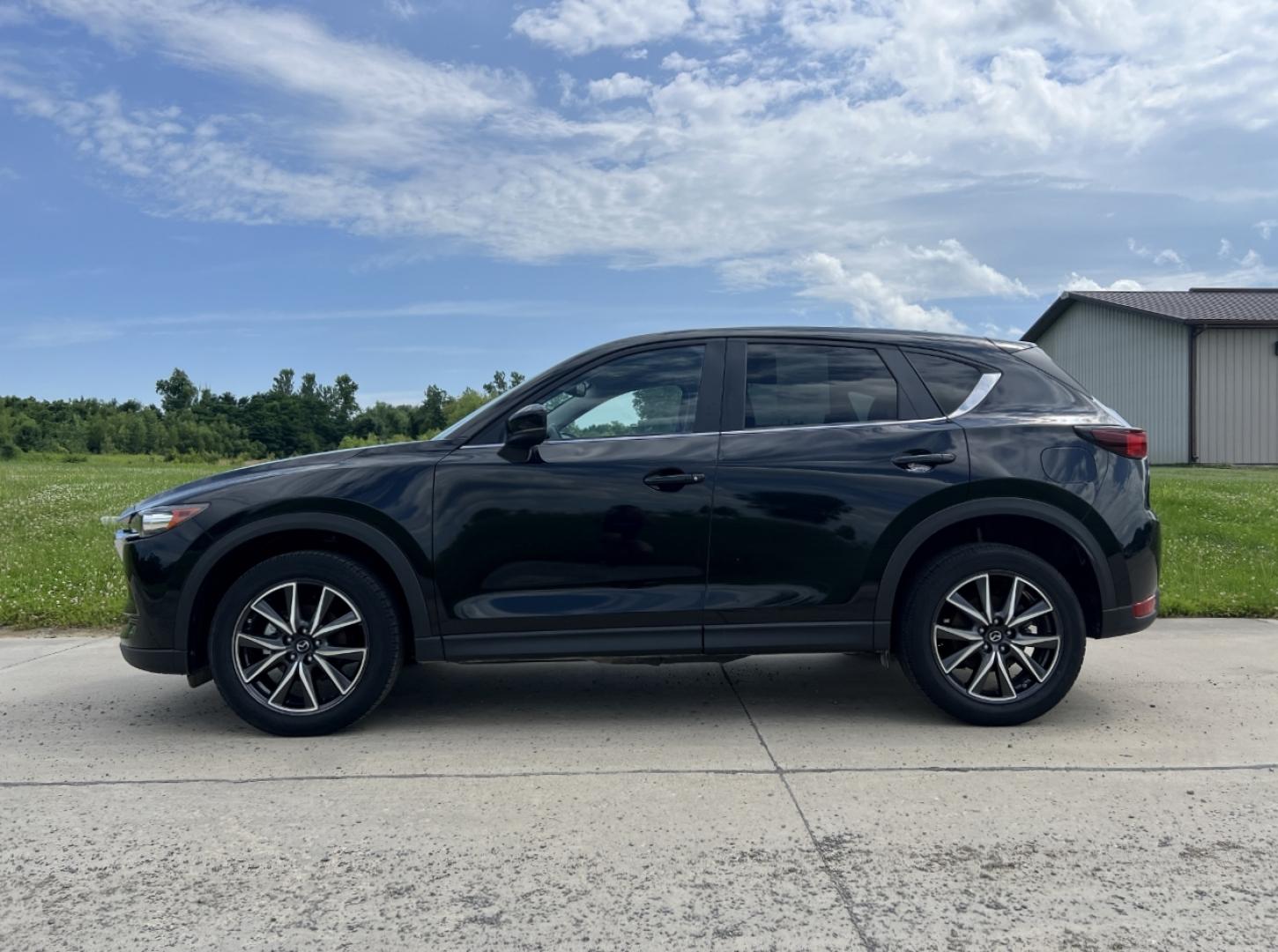 2018 BLACK /Black Mazda CX-5 Touring (JM3KFACM2J1) with an 2.5L 4 Cyl. engine, Automatic transmission, located at 506 S. Kingshighway, Cape Girardeau, MO, 63703, (573) 235-5000, 37.294994, -89.556206 - 2018 Mazda CX-5 Touring Only 38xxx miles Front Wheel Drive 2.5L 4 Cyl. Automatic Backup Camera Power Driver Seat Heated Seats Sunroof Bluetooth Cruise Power Windows/Locks/Mirrors We have financing available and we accept trades! Fill out a credit application on our website or come by tod - Photo#7