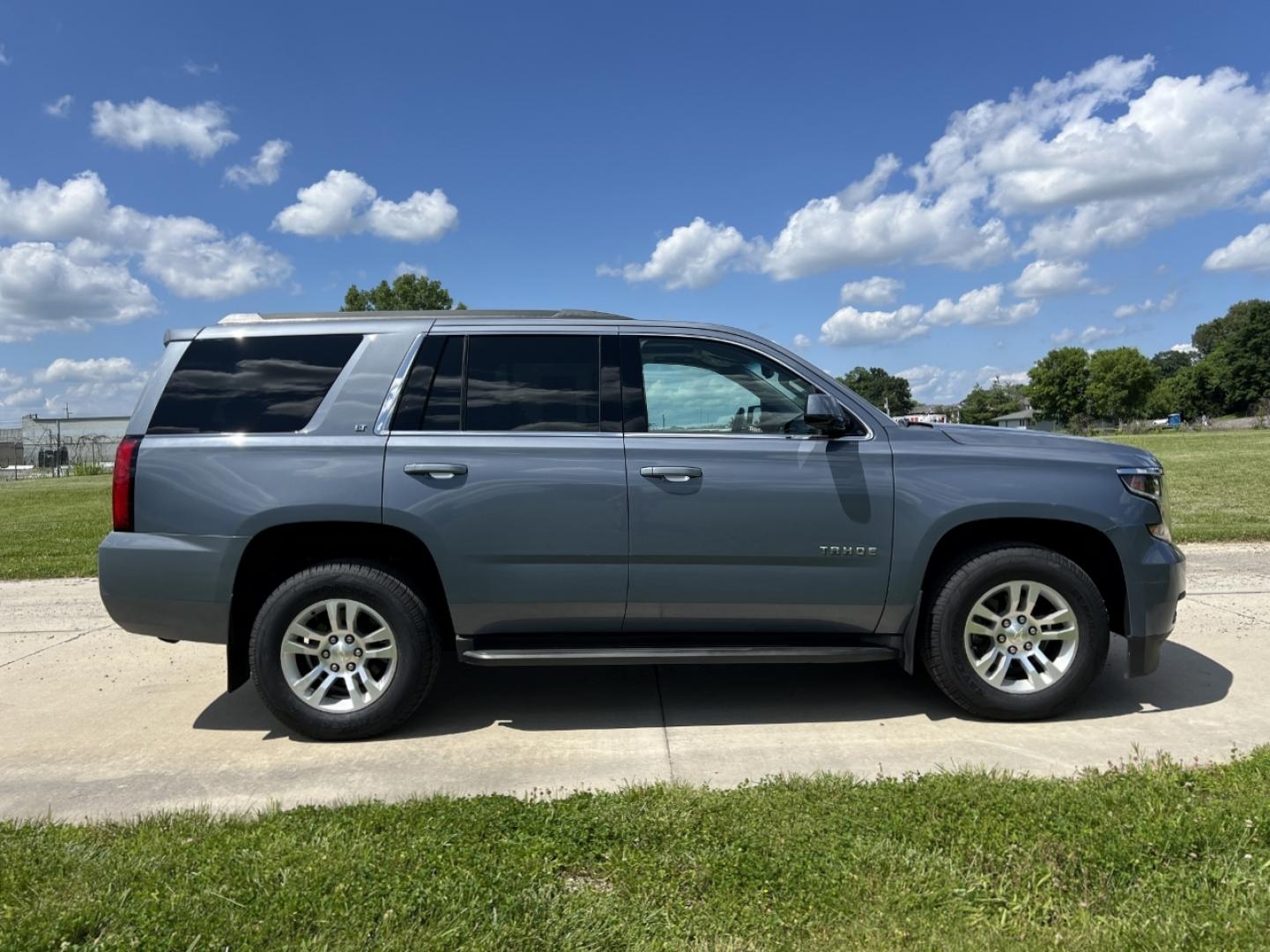 2015 BLUE /Gray Leather Chevrolet Tahoe LT 4WD (1GNSKBKC3FR) with an 5.3L V8 engine, Automatic transmission, located at 506 S. Kingshighway, Cape Girardeau, MO, 63703, (573) 235-5000, 37.294994, -89.556206 - 2015 Chevrolet Tahoe 1500 LT 138xxx miles 4 Wheel Drive 5.3L V8 Automatic Leather 3rd Row Navigation Rear Entertainment Power/Heated Seats Backup Camera Sunroof Bluetooth Cruise Power Windows/Locks/Mirrors We have financing available and we accept trades! Fill out a credit application - Photo#12