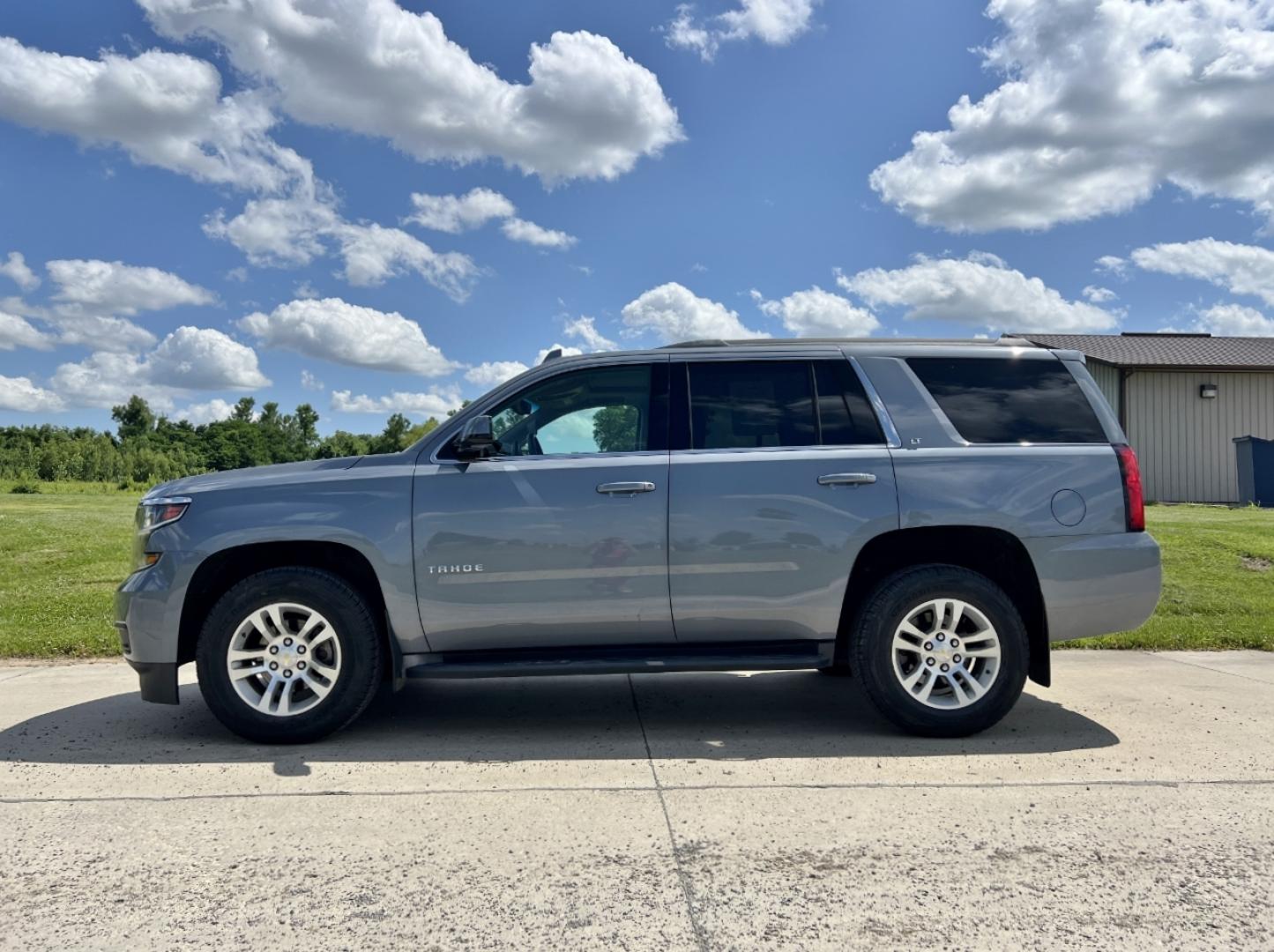2015 BLUE /Gray Leather Chevrolet Tahoe LT 4WD (1GNSKBKC3FR) with an 5.3L V8 engine, Automatic transmission, located at 506 S. Kingshighway, Cape Girardeau, MO, 63703, (573) 235-5000, 37.294994, -89.556206 - 2015 Chevrolet Tahoe 1500 LT 138xxx miles 4 Wheel Drive 5.3L V8 Automatic Leather 3rd Row Navigation Rear Entertainment Power/Heated Seats Backup Camera Sunroof Bluetooth Cruise Power Windows/Locks/Mirrors We have financing available and we accept trades! Fill out a credit application - Photo#11