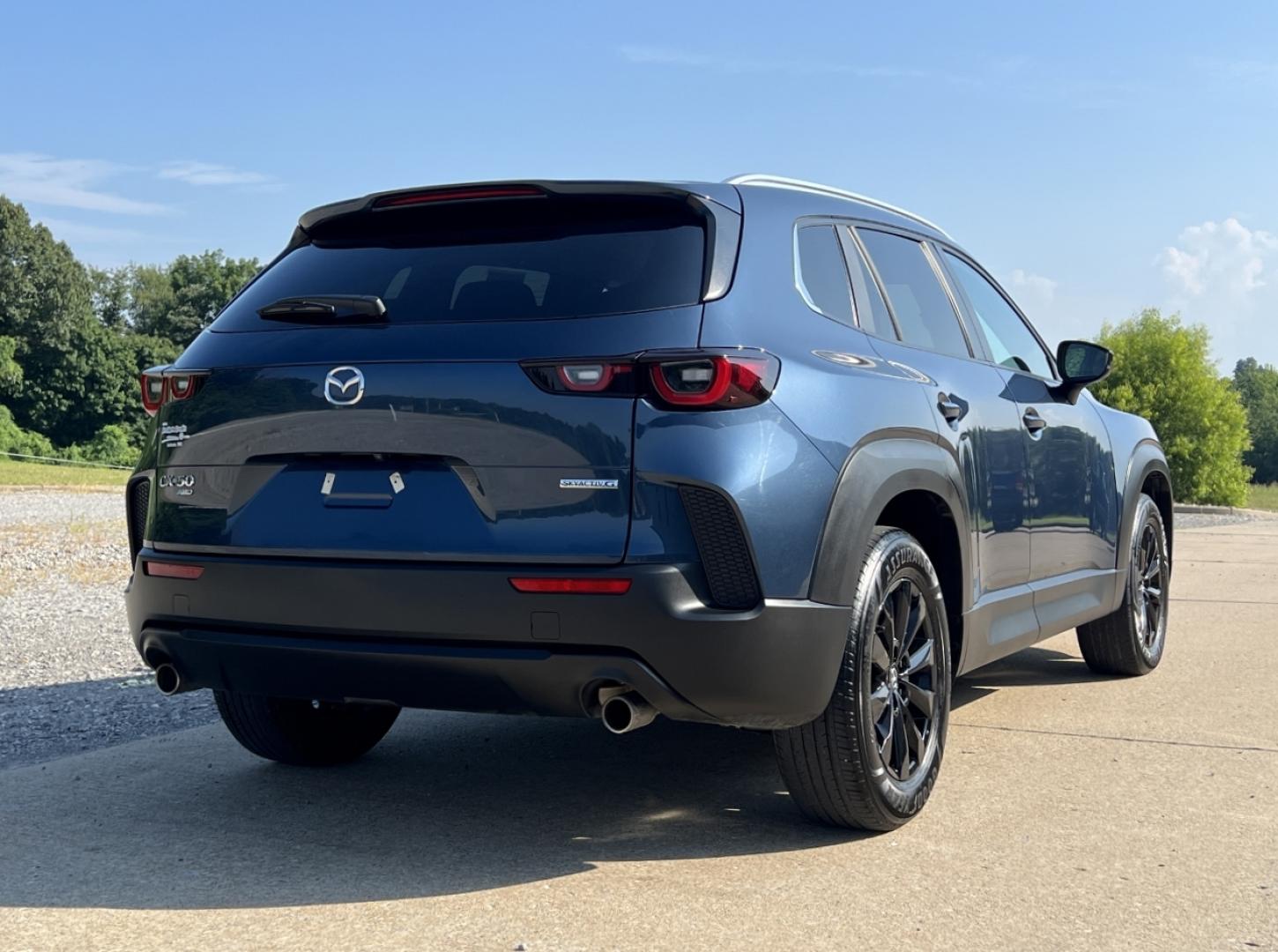 2023 BLUE /Black Mazda CX-50 2.5 S Select (7MMVABAM6PN) with an 2.5L 4 Cyl. engine, Automatic transmission, located at 2990 Old Orchard Rd., Jackson, MO, 63755, 37.354214, -89.612106 - 2023 Mazda CX-50 2.5 S Select Local 1-Owner 54xxx miles All Wheel Drive 2.5L 4 Cyl. Automatic Backup Camera Bluetooth Cruise Power Windows/Locks/Mirrors We have financing available and we accept trades! Fill out a credit application on our website or come by today! If you have any questio - Photo#6