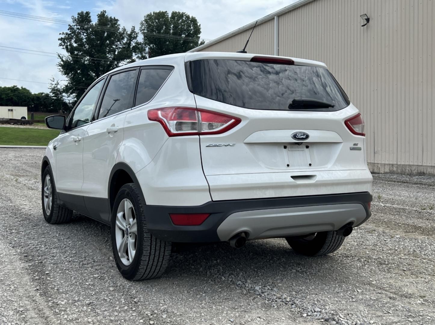 2014 WHITE /Gray Cloth Ford Escape SE FWD (1FMCU0GX8EU) with an 1.6L 4 Cyl. engine, Automatic transmission, located at 2990 Old Orchard Rd., Jackson, MO, 63755, 37.354214, -89.612106 - We have financing available and we accept trades! Fill out a credit application on our website or come by today! If you have any questions, give us a call at (573) 204-7777 or visit our website at firstautocredit.com. - Photo#7