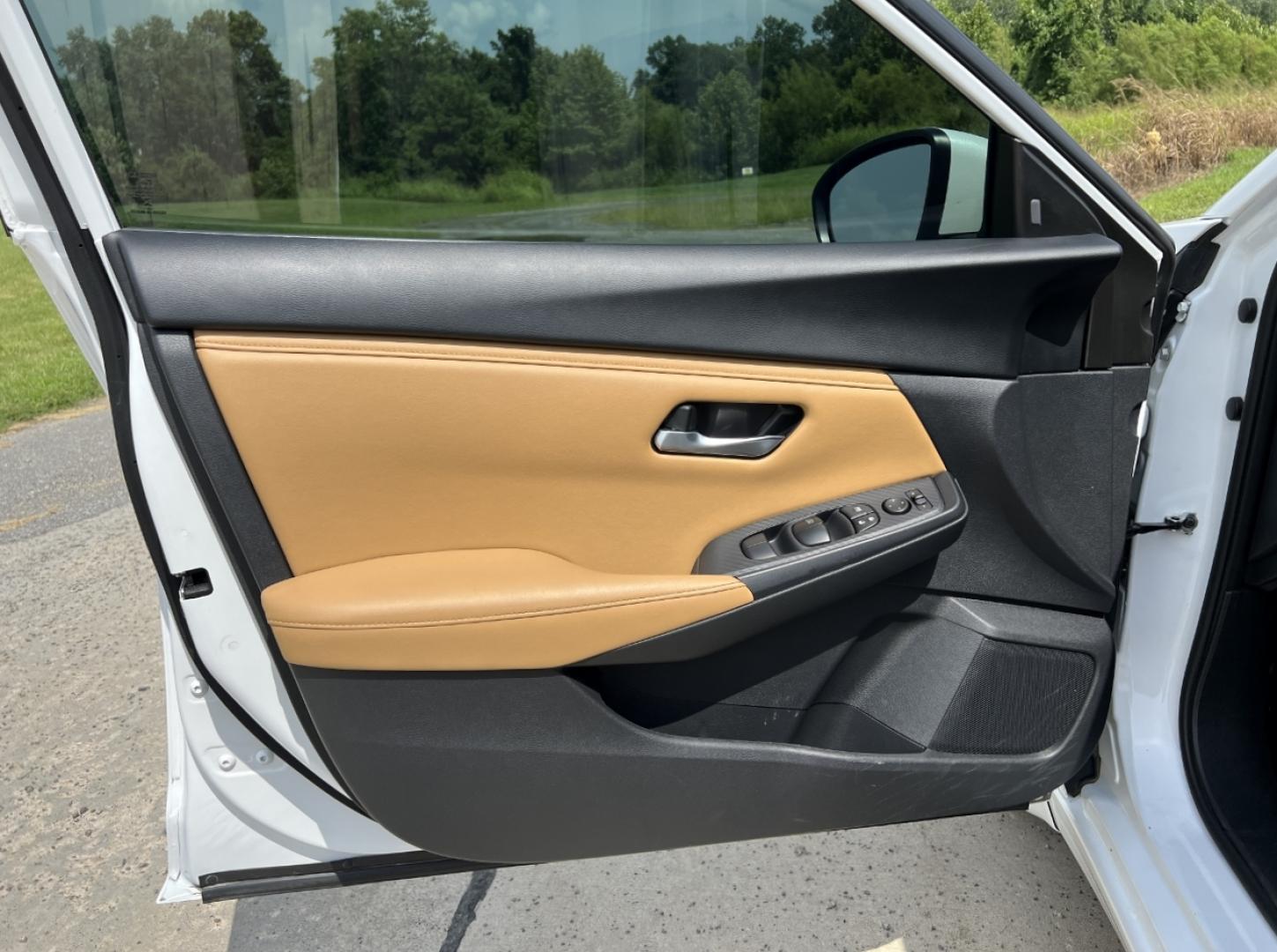 2023 WHITE /Tan Leather Nissan Sentra SV (3N1AB8CV9PY) with an 1.8L 4 Cyl. engine, CVT transmission, located at 506 S. Kingshighway, Cape Girardeau, MO, 63703, (573) 235-5000, 37.294991, -89.553635 - 2023 Nissan Sentra SV 1-Owner 50xxx miles Front Wheel Drive 2.0L 4 Cyl. Automatic Leather Backup Camera Power Driver Seat Heated Seats Heated Steering Wheel Sunroof Bluetooth Remote Start Cruise Power Windows/Locks/Mirrors We have financing available and we accept trades! Fill out a - Photo#14