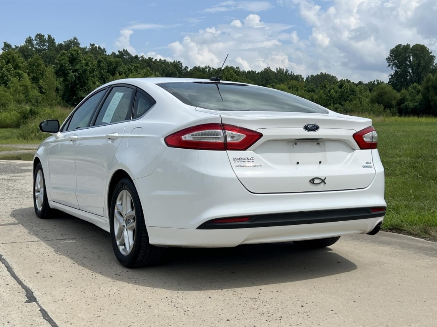 2014 WHITE /Black Cloth Ford Fusion SE (1FA6P0HD8E5) with an 1.5L 4 Cyl. engine, Automatic transmission, located at 506 S. Kingshighway, Cape Girardeau, MO, 63703, (573) 235-5000, 37.294991, -89.553635 - 2014 Ford Fusion SE 1-Owner Only 79xxx miles Front Wheel Drive 1.5L 4 Cyl. Automatic Power Driver Seat Bluetooth Cruise Power Windows/Locks/Mirrors We have financing available and we accept trades! Fill out a credit application on our website or come by today! If you have any questions, g - Photo#7