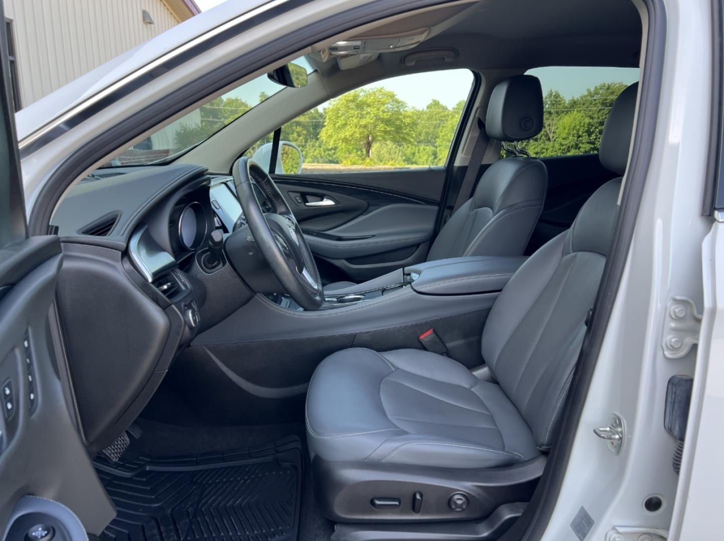 2020 WHITE /Gray Leather Buick Envision Essence AWD (LRBFXCSA0LD) with an 2.5L 4 Cyl. engine, Automatic transmission, located at 506 S. Kingshighway, Cape Girardeau, MO, 63703, (573) 235-5000, 37.294991, -89.553635 - 2020 Buick Envision Essence 1-Owner Only 48xxx miles Front Wheel Drive 2.5L 4 Cyl. Automatic Leather Backup Camera Power/Heated Seats Heated Rear Seats Heated Steering Wheel Bluetooth Remote Start Cruise Power Windows/Locks/Mirrors We have financing available and we accept trades! Fil - Photo#15