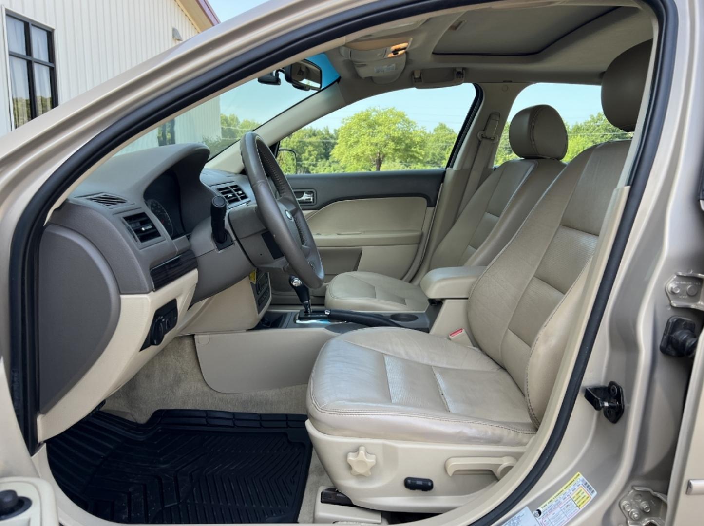 2006 GOLD /Tan Leather Ford Fusion V6 SEL (3FAHP08176R) with an 3.0L V6 engine, Automatic transmission, located at 506 S. Kingshighway, Cape Girardeau, MO, 63703, (573) 235-5000, 37.294991, -89.553635 - 2006 Ford Fusion SEL 128xxx miles Front Wheel Drive 3.0L V6 Automatic Leather Power Driver Seat Heated Seats Sunroof Cruise Power Windows/Locks/Mirrors We have financing available and we accept trades! Fill out a credit application on our website or come by today! If you have any questio - Photo#13
