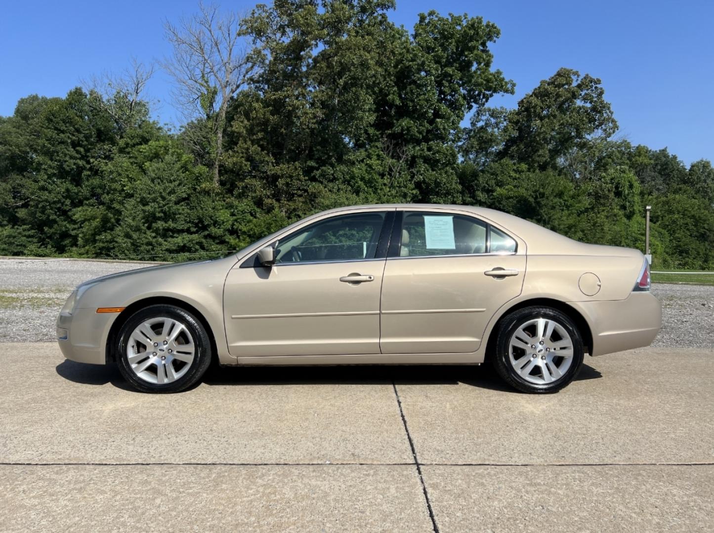 2006 GOLD /Tan Leather Ford Fusion V6 SEL (3FAHP08176R) with an 3.0L V6 engine, Automatic transmission, located at 506 S. Kingshighway, Cape Girardeau, MO, 63703, (573) 235-5000, 37.294991, -89.553635 - 2006 Ford Fusion SEL 128xxx miles Front Wheel Drive 3.0L V6 Automatic Leather Power Driver Seat Heated Seats Sunroof Cruise Power Windows/Locks/Mirrors We have financing available and we accept trades! Fill out a credit application on our website or come by today! If you have any questio - Photo#6