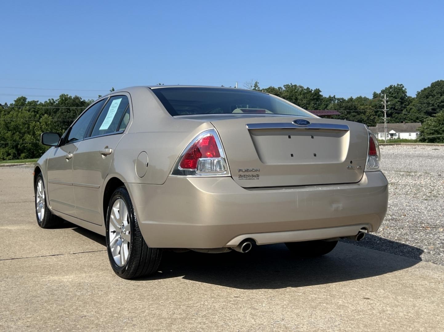2006 GOLD /Tan Leather Ford Fusion V6 SEL (3FAHP08176R) with an 3.0L V6 engine, Automatic transmission, located at 506 S. Kingshighway, Cape Girardeau, MO, 63703, (573) 235-5000, 37.294991, -89.553635 - 2006 Ford Fusion SEL 128xxx miles Front Wheel Drive 3.0L V6 Automatic Leather Power Driver Seat Heated Seats Sunroof Cruise Power Windows/Locks/Mirrors We have financing available and we accept trades! Fill out a credit application on our website or come by today! If you have any questio - Photo#9