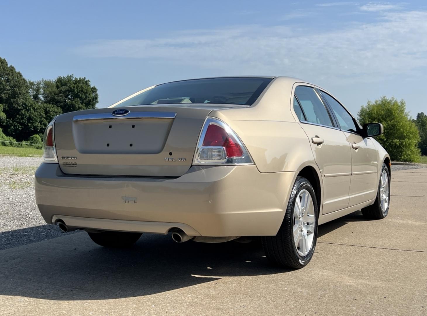 2006 GOLD /Tan Leather Ford Fusion V6 SEL (3FAHP08176R) with an 3.0L V6 engine, Automatic transmission, located at 506 S. Kingshighway, Cape Girardeau, MO, 63703, (573) 235-5000, 37.294991, -89.553635 - 2006 Ford Fusion SEL 128xxx miles Front Wheel Drive 3.0L V6 Automatic Leather Power Driver Seat Heated Seats Sunroof Cruise Power Windows/Locks/Mirrors We have financing available and we accept trades! Fill out a credit application on our website or come by today! If you have any questio - Photo#8