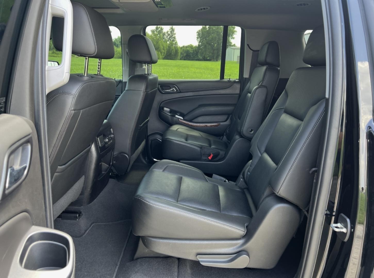 2019 BLACK /Black Leather Chevrolet Suburban Premier 4WD (1GNSKJKJ7KR) with an 6.2L V8 engine, Automatic transmission, located at 506 S. Kingshighway, Cape Girardeau, MO, 63703, (573) 235-5000, 37.294991, -89.553635 - 2019 Chevrolet Suburban 1500 Premier 92xxx miles 4 Wheel Drive 6.2L V8 Automatic Leather 3rd Row Navigation Rear Entertainment Power/Heated/Cooled Seats Heated Rear Seats Heated Steering Wheel Backup Camera Bluetooth Cruise Power Windows/Locks/Mirrors We have financing available and - Photo#21