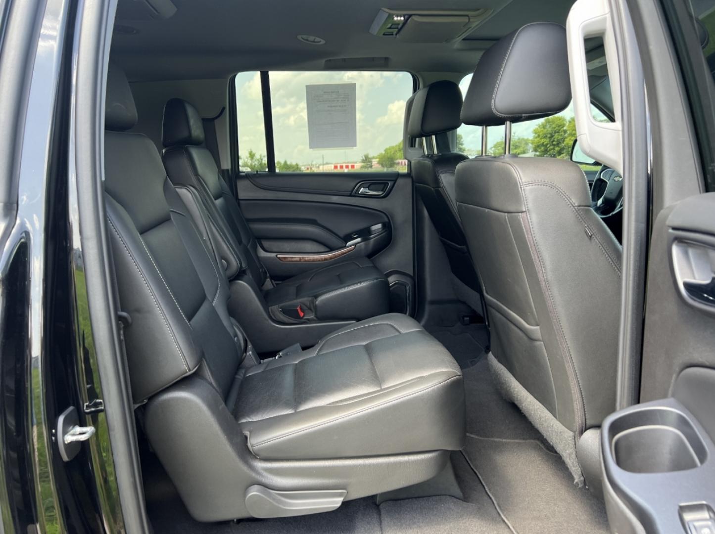 2019 BLACK /Black Leather Chevrolet Suburban Premier 4WD (1GNSKJKJ7KR) with an 6.2L V8 engine, Automatic transmission, located at 506 S. Kingshighway, Cape Girardeau, MO, 63703, (573) 235-5000, 37.294991, -89.553635 - 2019 Chevrolet Suburban 1500 Premier 92xxx miles 4 Wheel Drive 6.2L V8 Automatic Leather 3rd Row Navigation Rear Entertainment Power/Heated/Cooled Seats Heated Rear Seats Heated Steering Wheel Backup Camera Bluetooth Cruise Power Windows/Locks/Mirrors We have financing available and - Photo#22